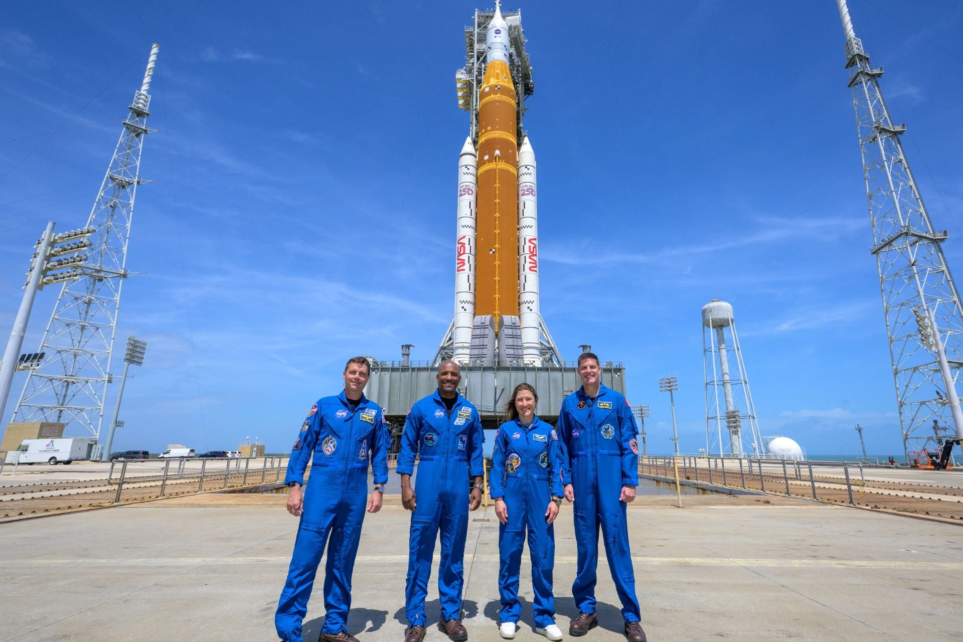 From left, NASA astronauts Reid Wiseman, Victor Glover, Christina Koch, and CSA (Canadian Space Agency) astronaut Jeremy Hansen visit NASA’s Artemis 2 SLS (Space Launch System) rocket and Orion spacecraft on March 30, 2026, at NASA’s Kennedy Space Center in Florida