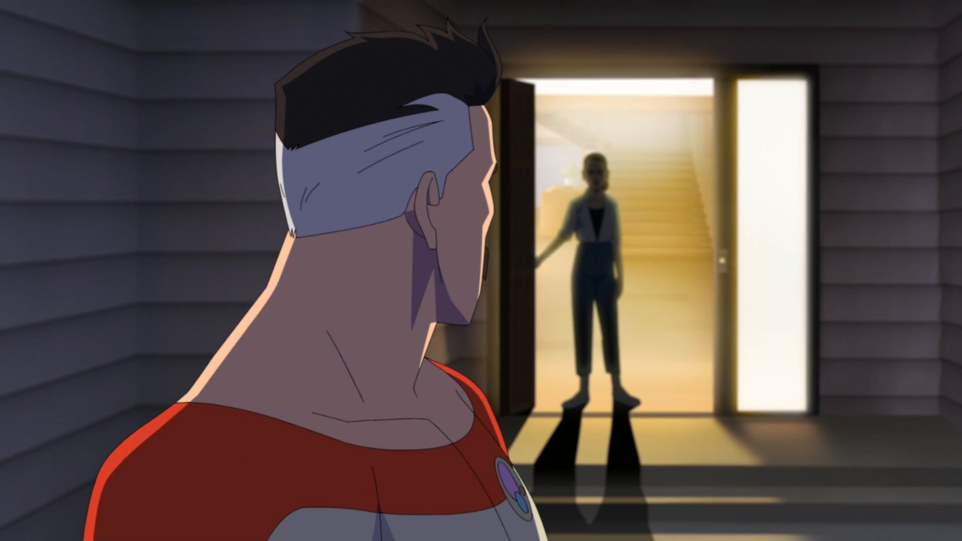 Invincible still of Debbie waiting in the threshold of a doorway for Nolan.