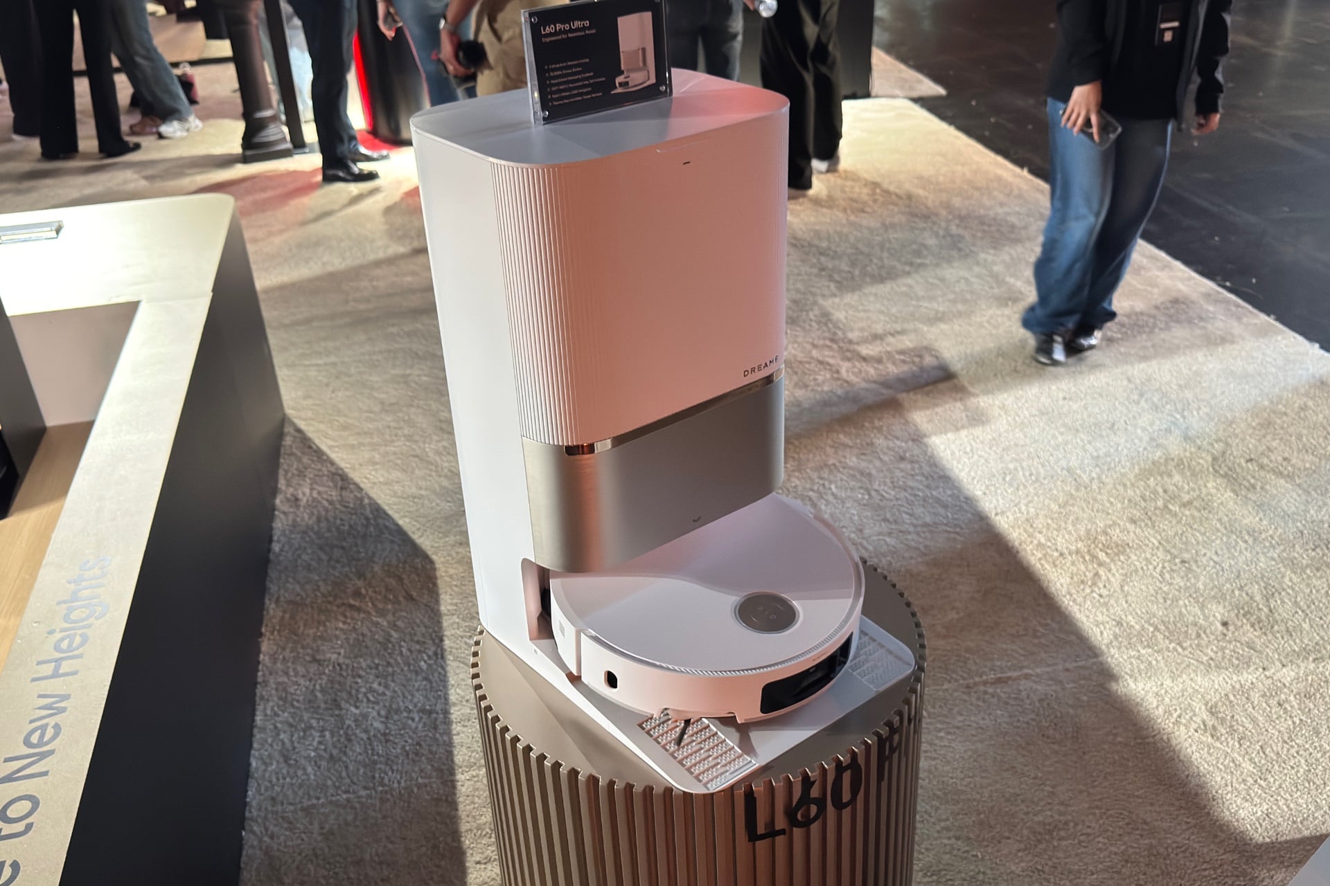 The L60 Pro Ultra sitting docked on a pedestal.