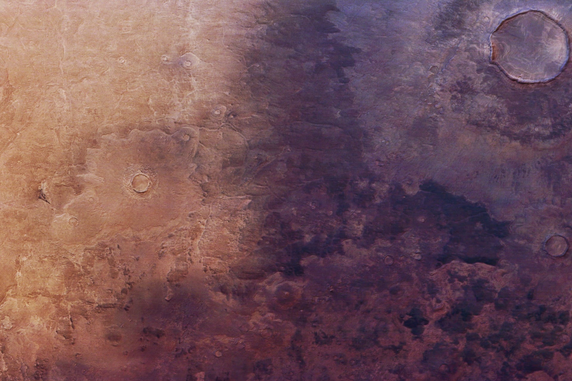 ESA's Mars Express captured a blanket of dark ash creeping across the Red Planet.