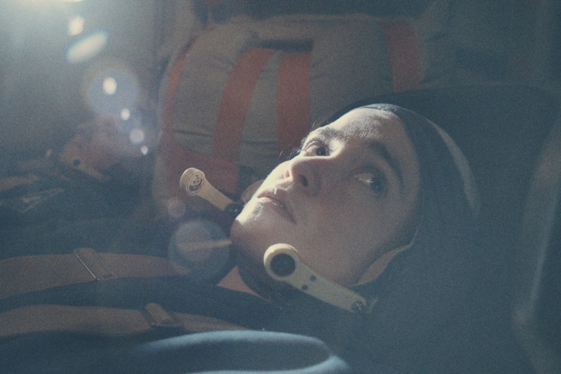 A cosmonaut (Alice Englert) takes flight in 'Star City.'