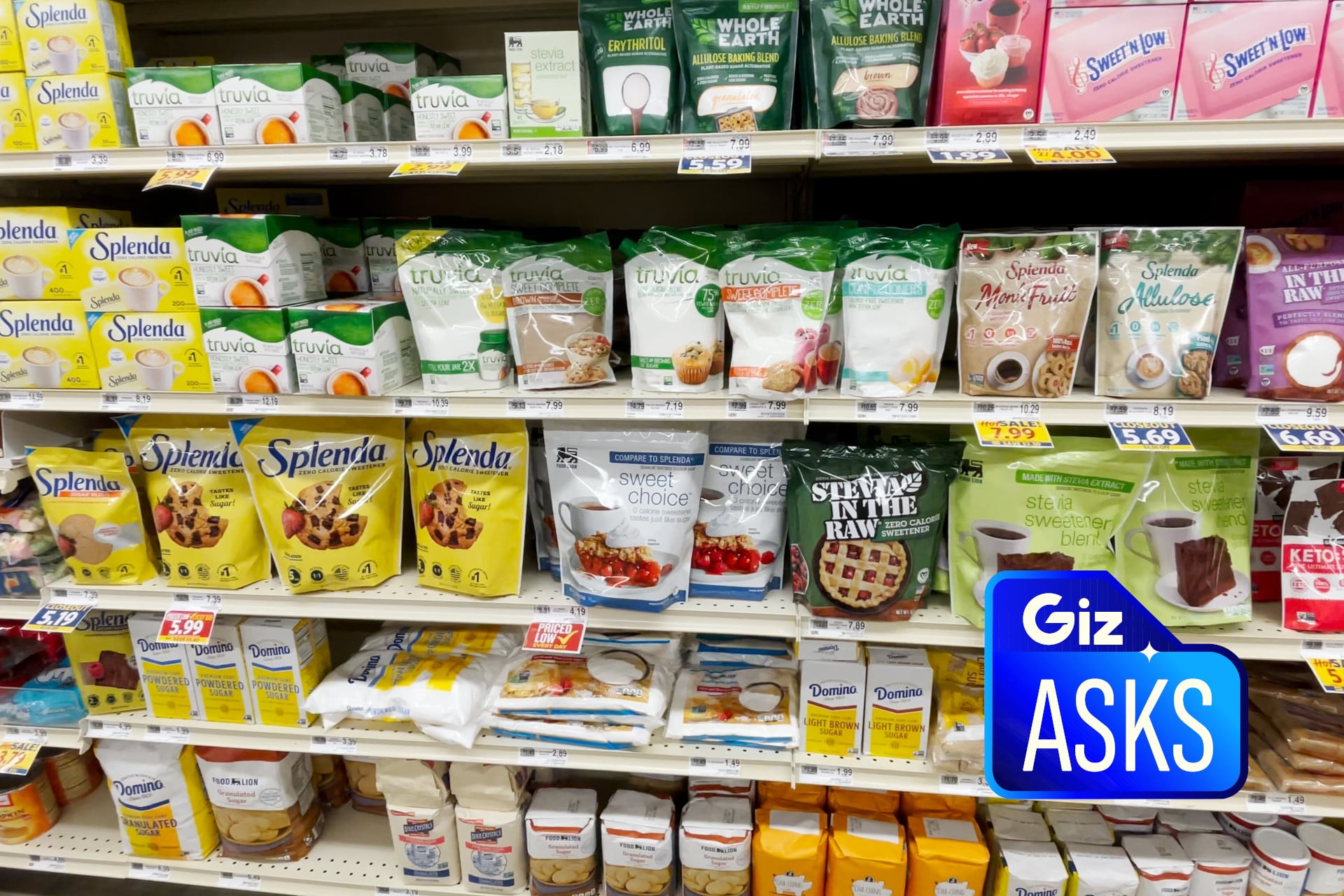 Artificial sweeteners stocked on a store shelf.