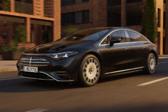 The Mercedes-Benz EQS is seen on the street from the side.