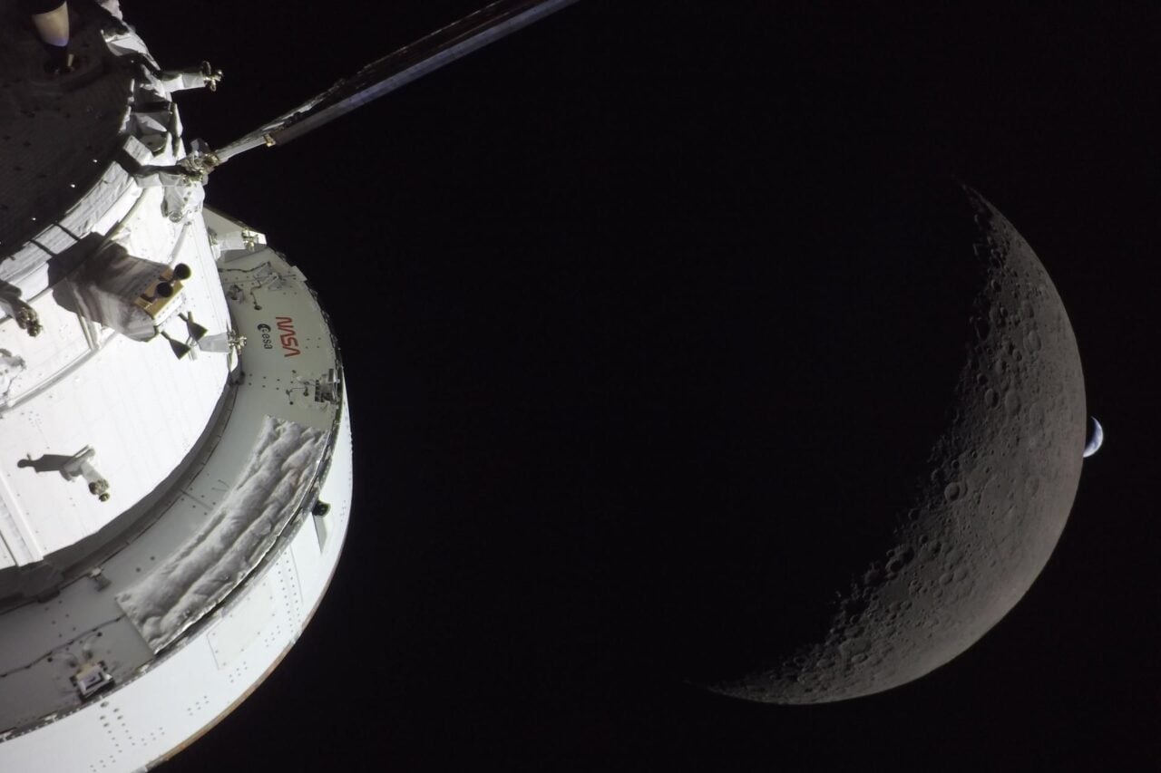 The Orion spacecraft, the Moon, and Earth