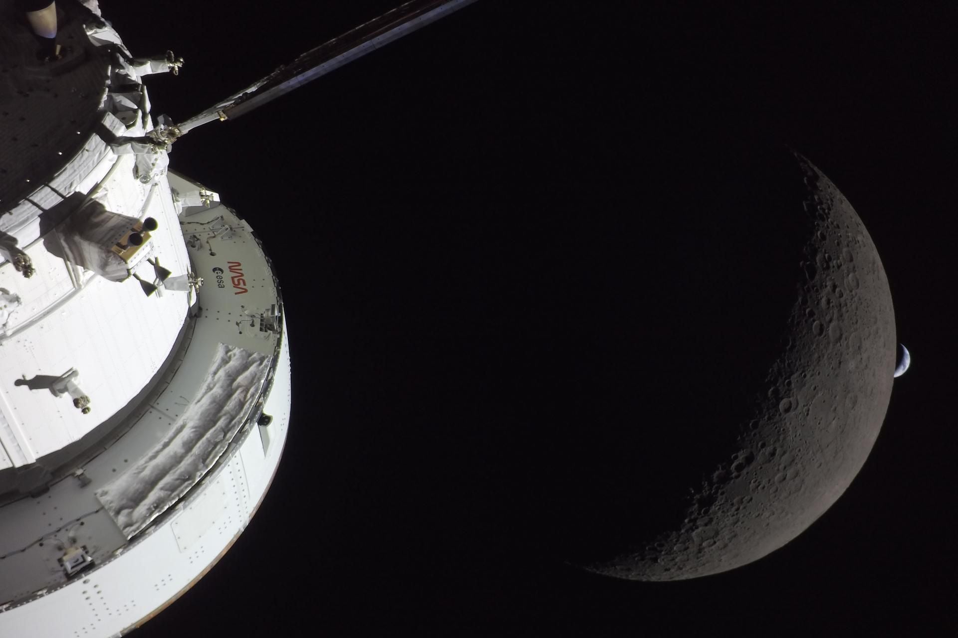 NASA’s Orion spacecraft captures the Moon and the Earth in one frame during the Artemis 2 crew’s deep space journey at 6:42 p.m. ET on the sixth day of the mission