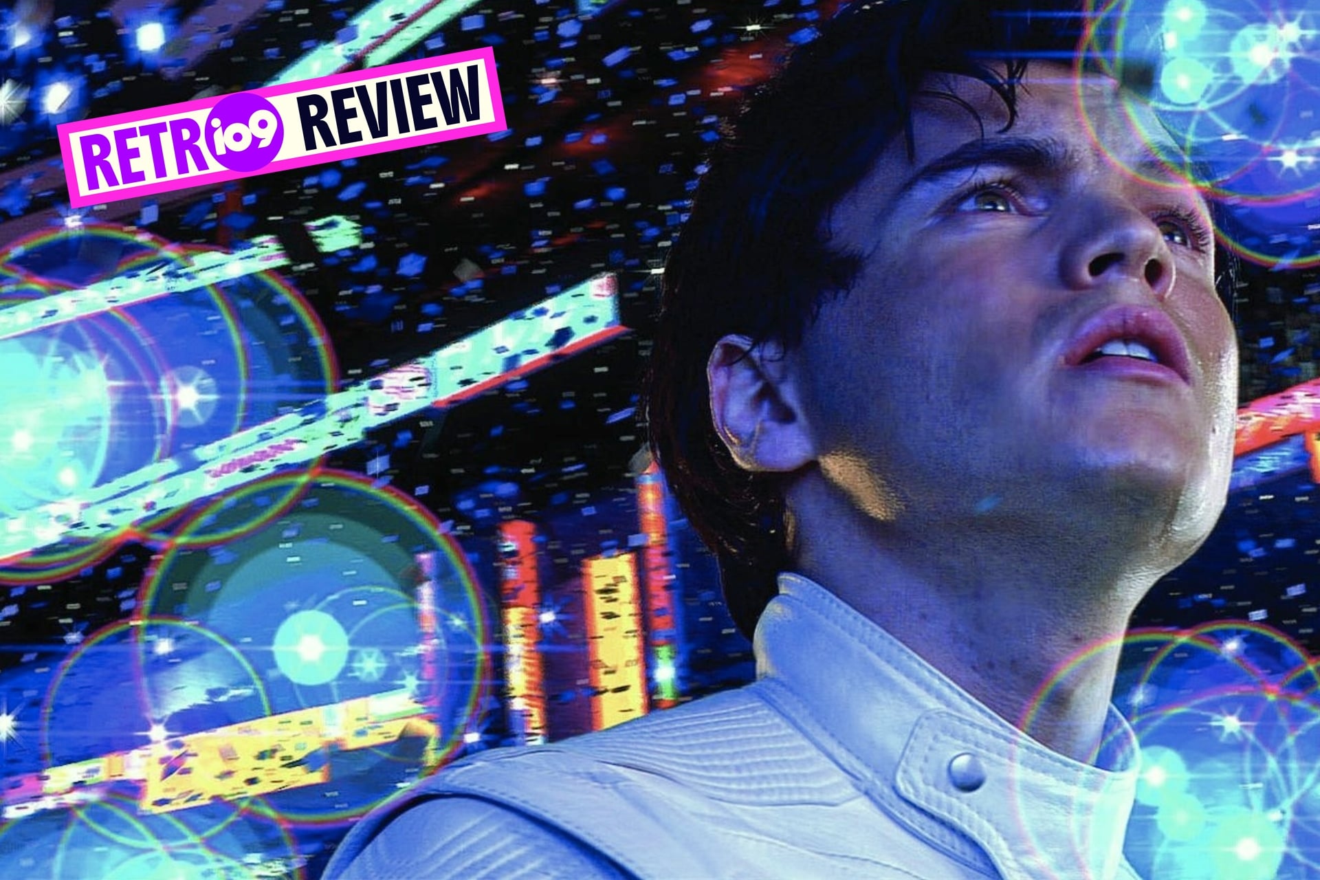 Speed Racer still of Emile Hirsch's Speed looking up at the dazzling race track lights.