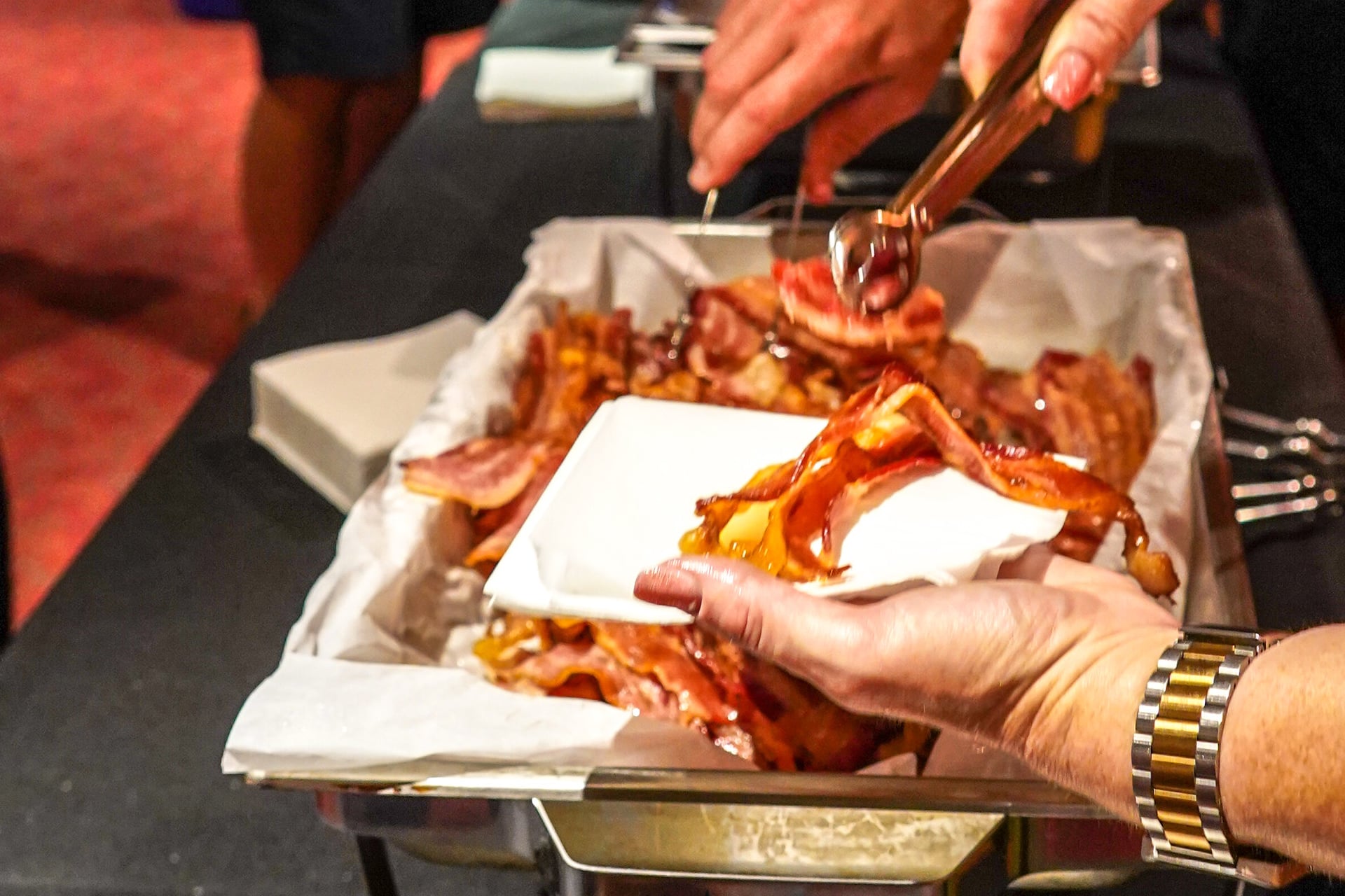 An attendee at Ketofest 2018 in Connecticut loads up on bacon, a meaty snack high in the low-density lipoprotein cholesterol that the newly retracted study claimed was healthy.