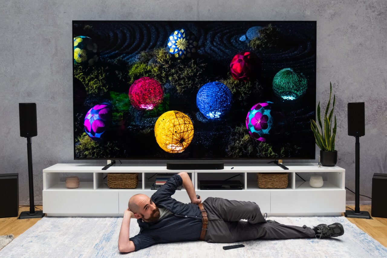 Sony Bravia 9 II RGB TV with a person lying in front of it