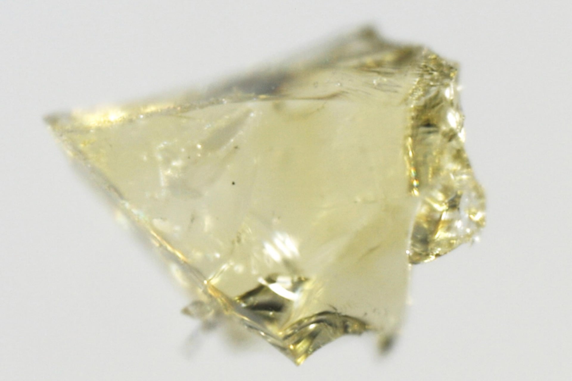 An optical microscopy image of a roughly millimeter-long shard of the newly tested zeolitic imidazolate framework glass, mixed with lithium benzimidazolate. 