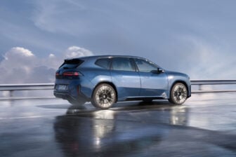 BMW's ix3 exterior is seen on a beach