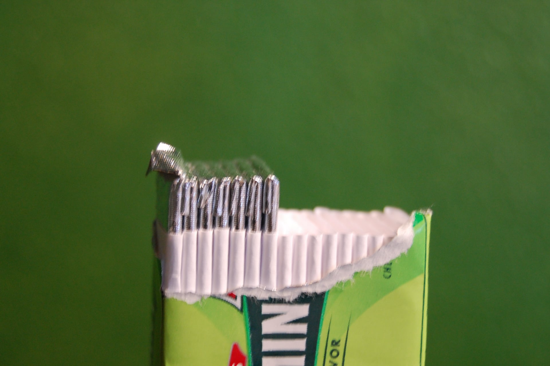 Above, an open package of breath-freshening chewing gum.