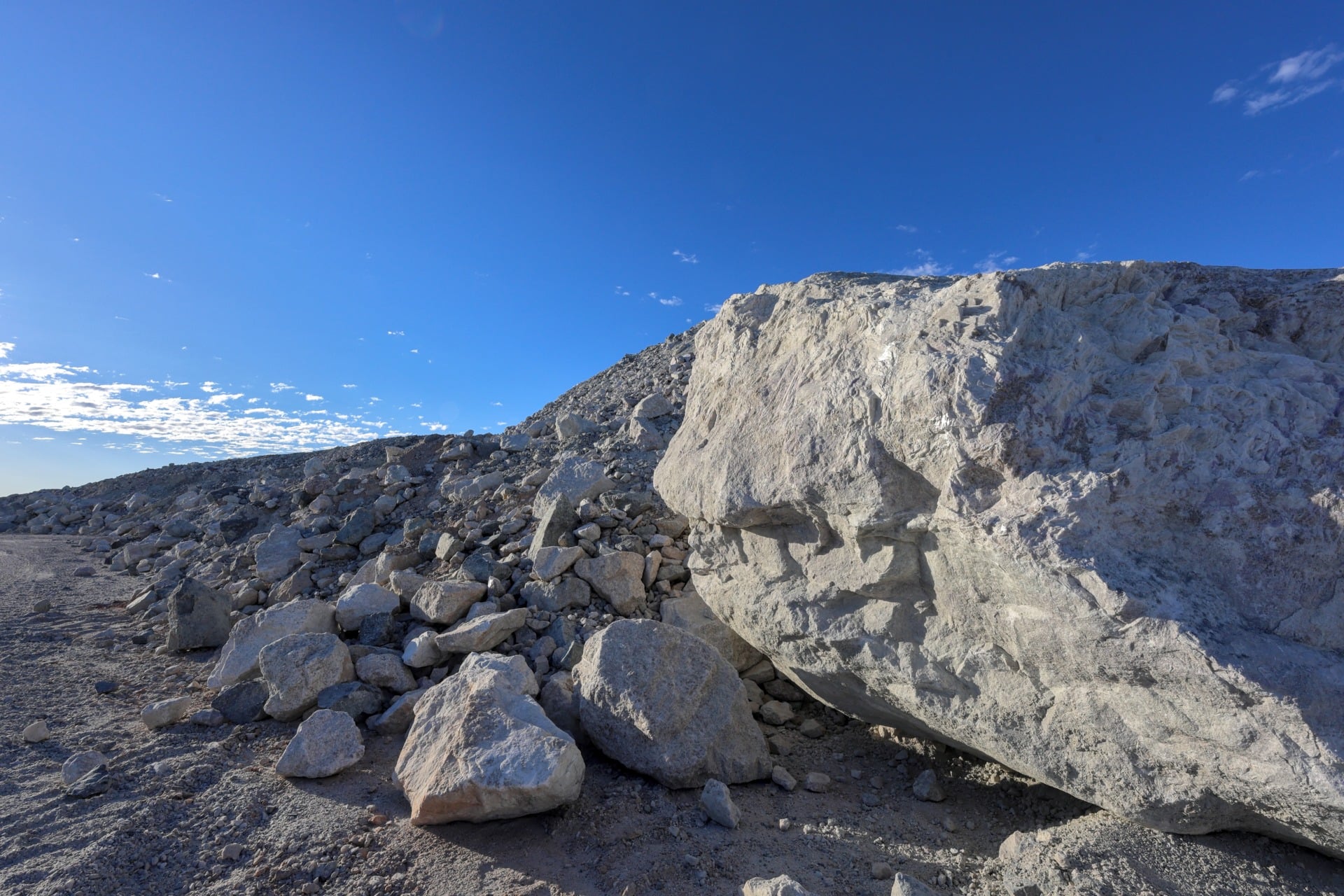 Large lithium ore rocks, or spodumene concentrates.
