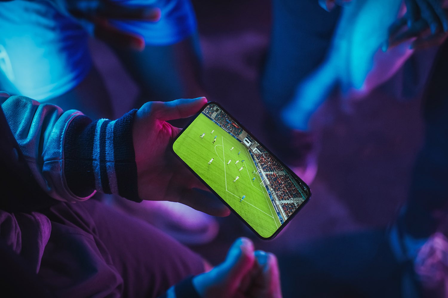 Close,up,smartphone,screen,with,a,soccer,championship,live,broadcast.