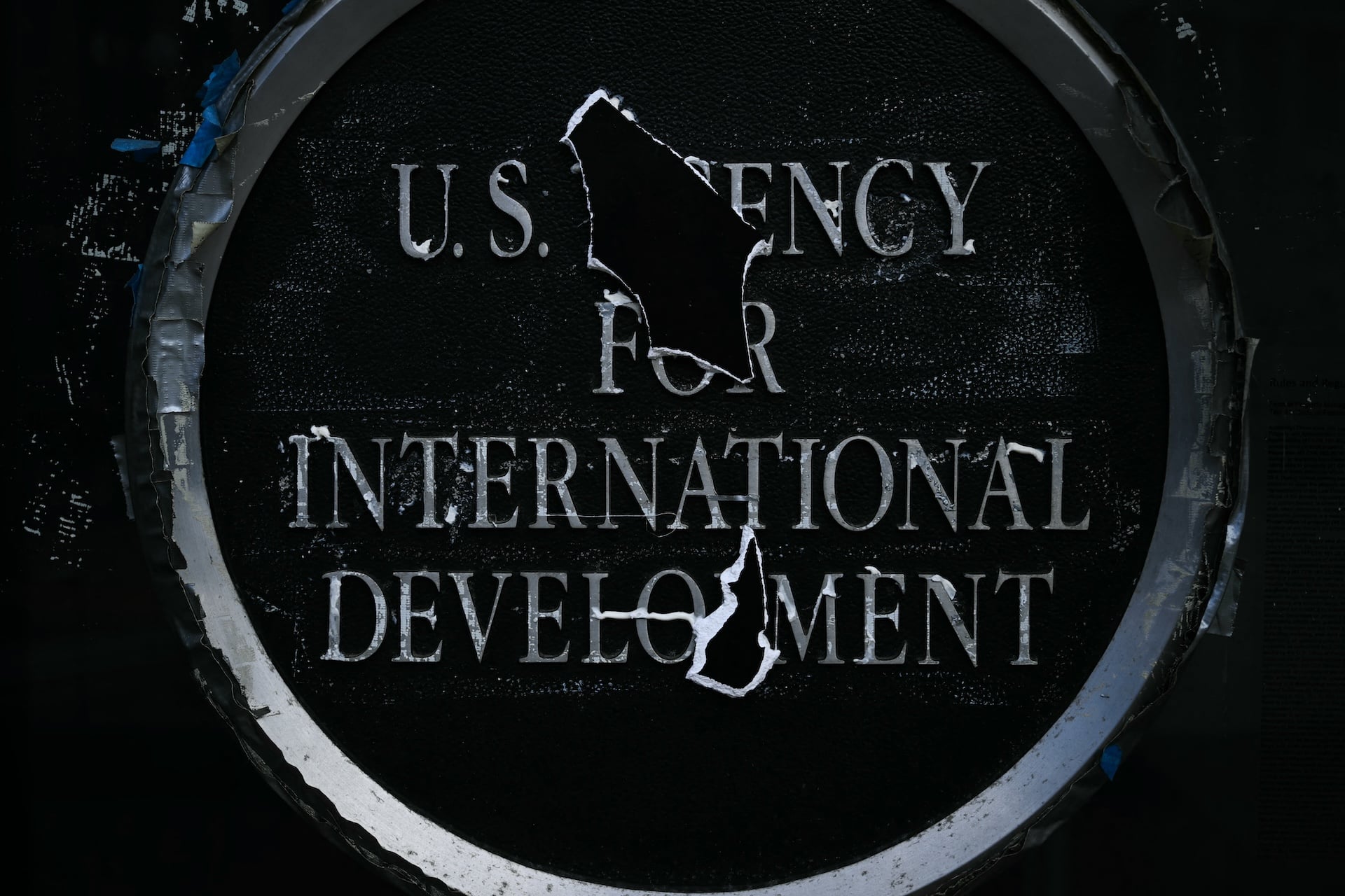Remnants of signage for the US Agency for International Development (USAID) on the facade of the Ronald Reagan Building and International Trade Center building in Washington, DC, on December 29, 2025. 