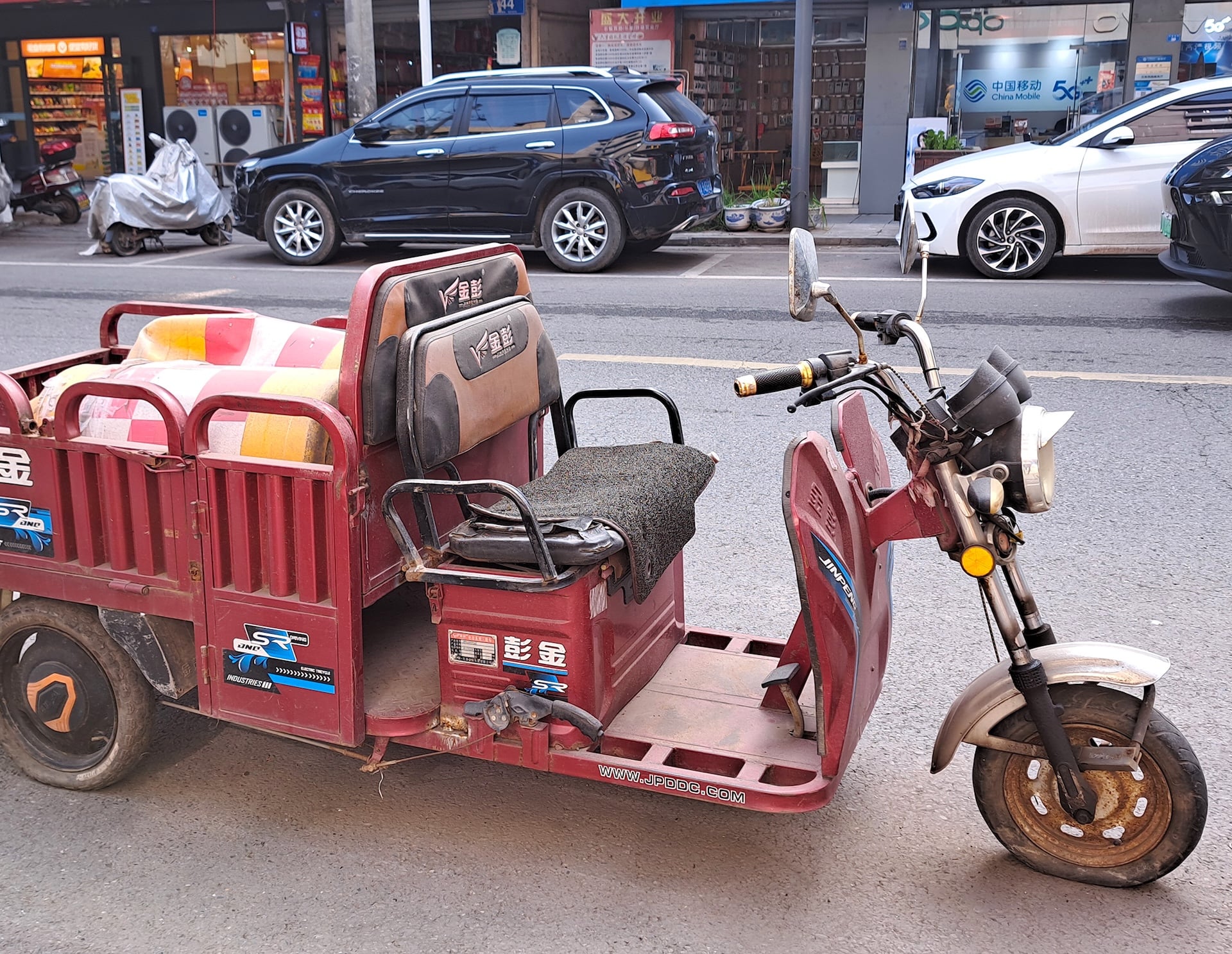 stock photo of a similar e-trike, photographed in Chengdu, China