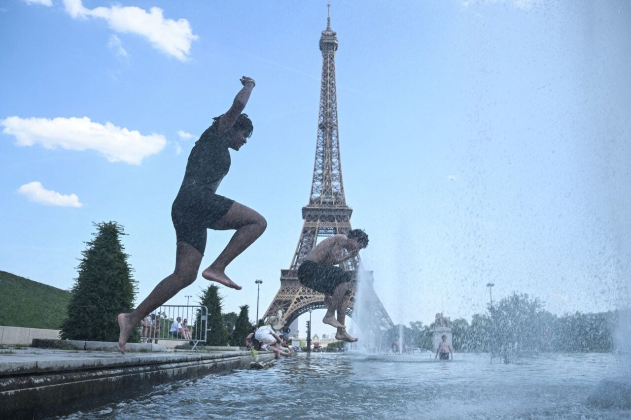 Kids Swimming In Fountain
