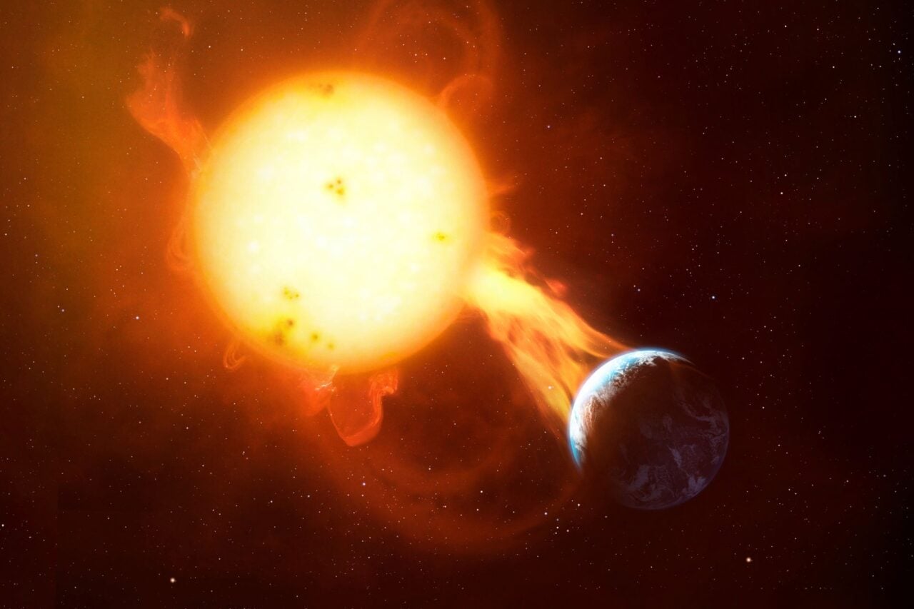 Illustration of a coronal mass ejection impacting the Earth's atmosphere.