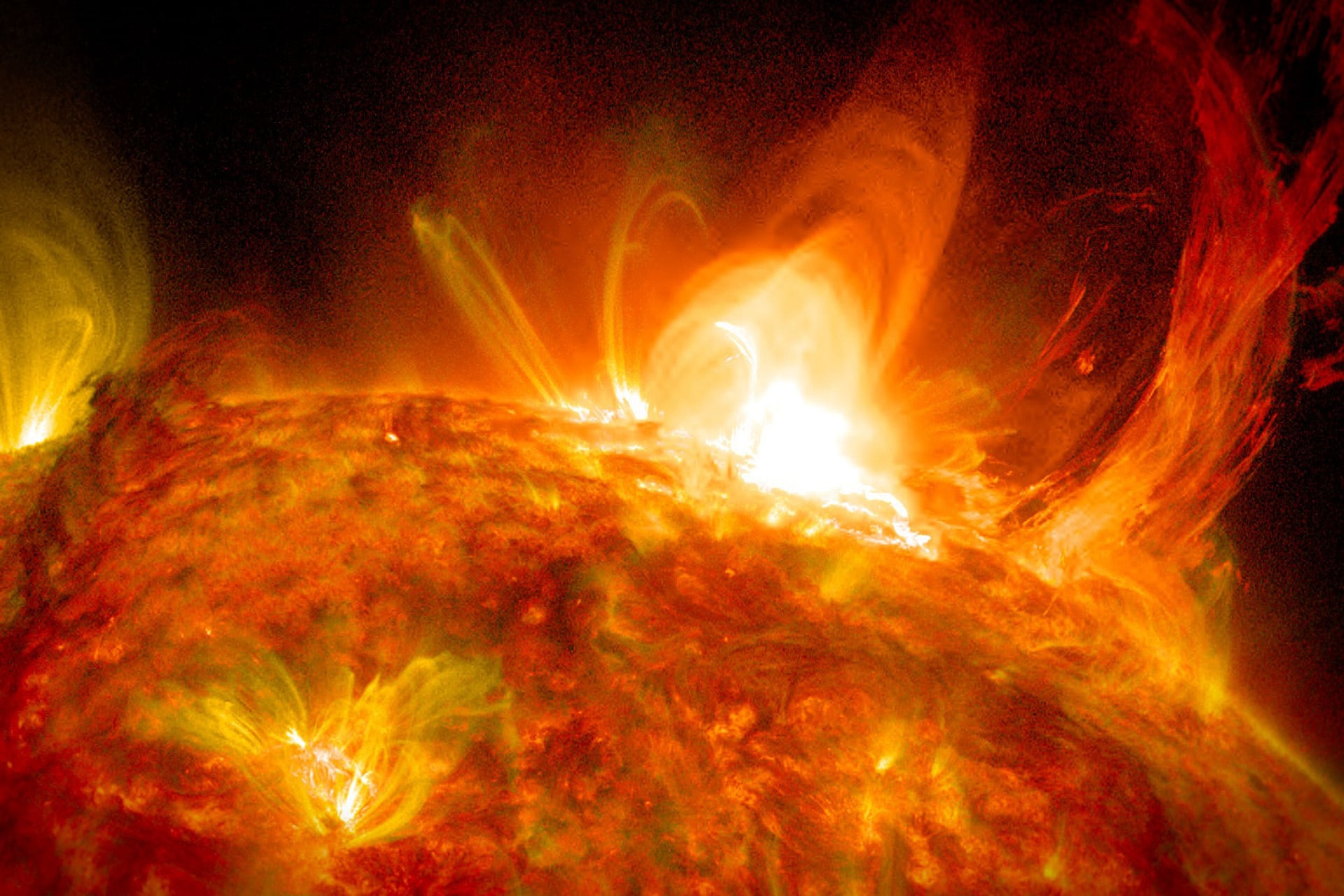 The Sun unleashing a powerful burst of radiation known as a solar flare. 