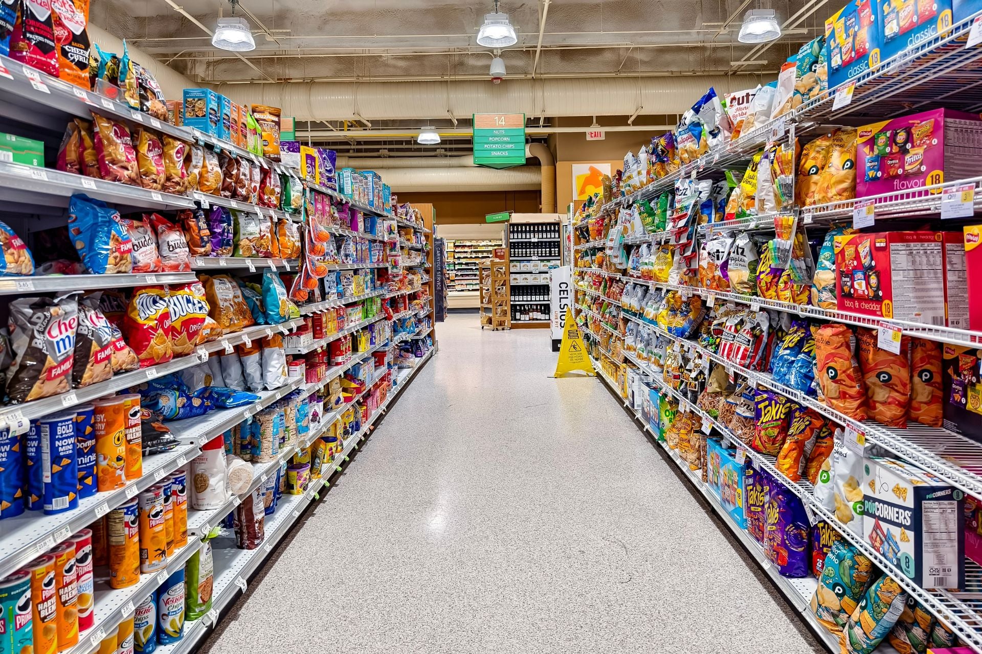A snack aisle at a supermarket.