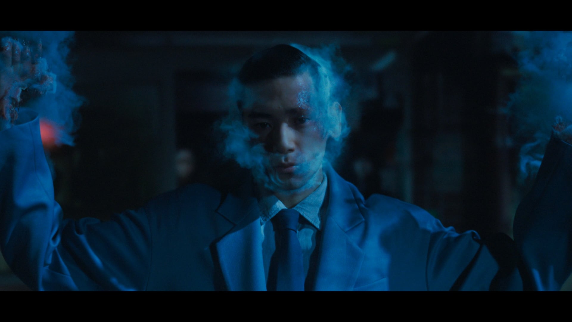 Human Vapor still of a man turning into smoke.