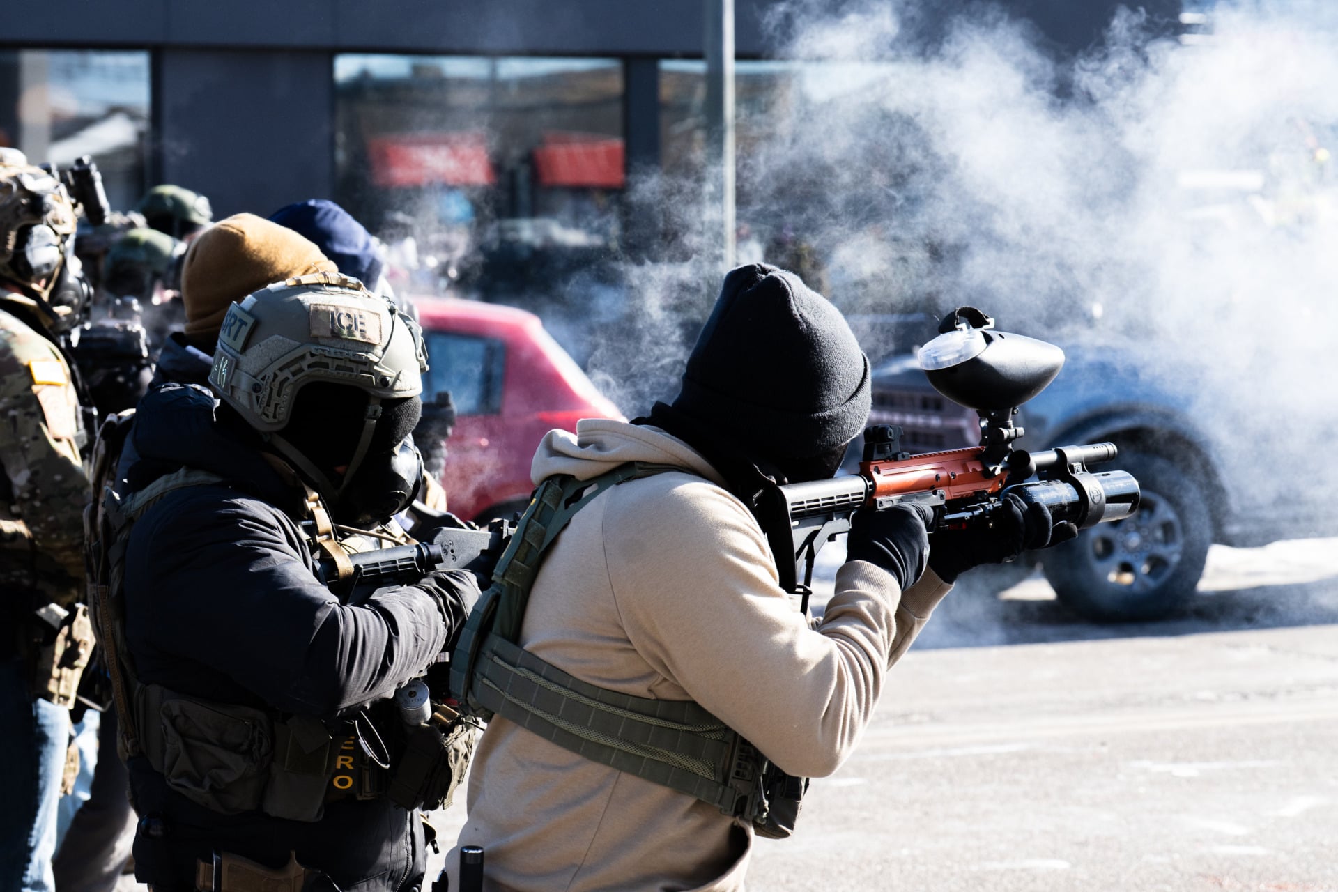ICE and U.S. Border Patrol agents fired nonlethal weapons at protestors on Nicollet Avenue in Minneapolis on January 24, 2026, following agents’ killing of civilians Alex Pretti and Renee Good earlier that month.