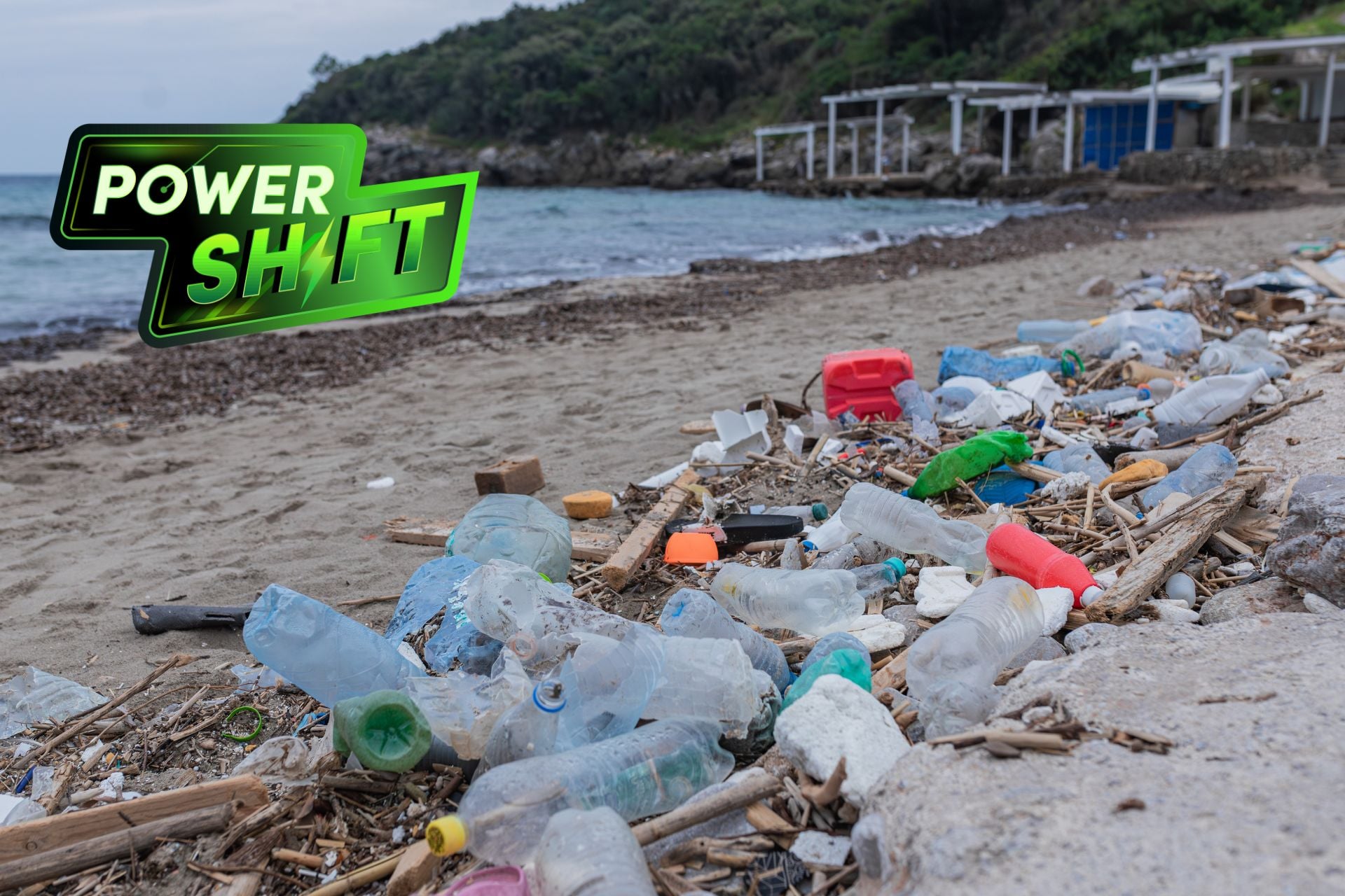 Plastic waste litters a beach.