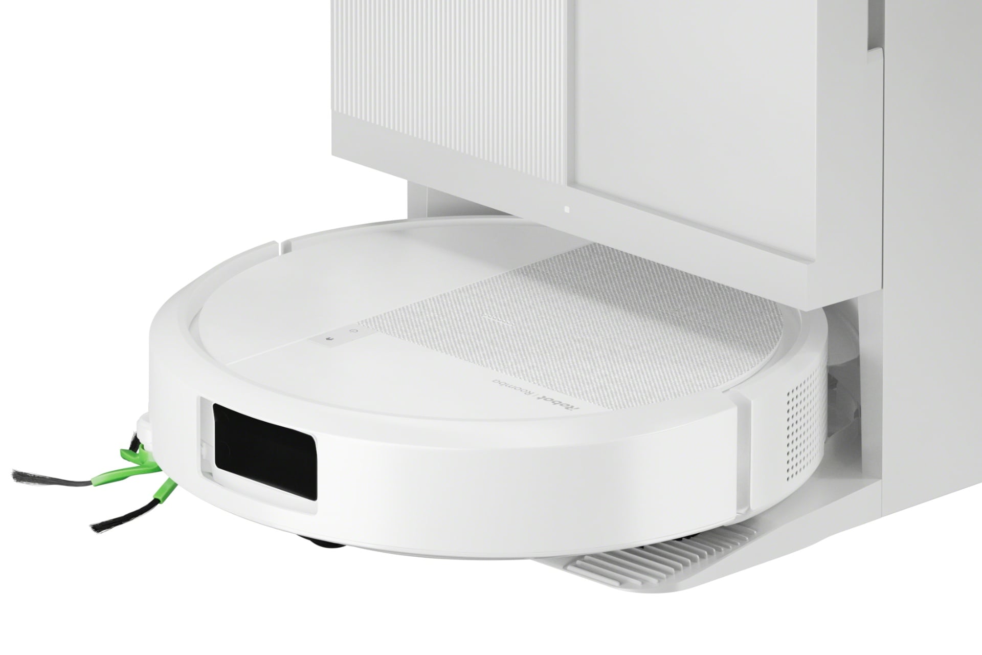 A close-up of the Roomba Plus 515 in its dock. It's white, with a gray, partial square panel taking up most of its top.