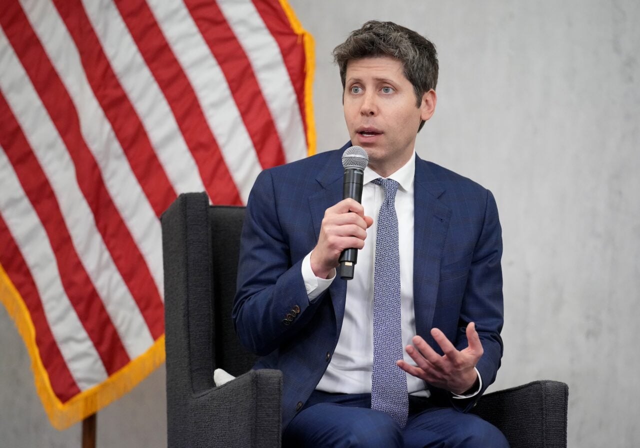 OpenAI CEO Sam Altman speaks at a conference at the Federal Reserve in July 2025.