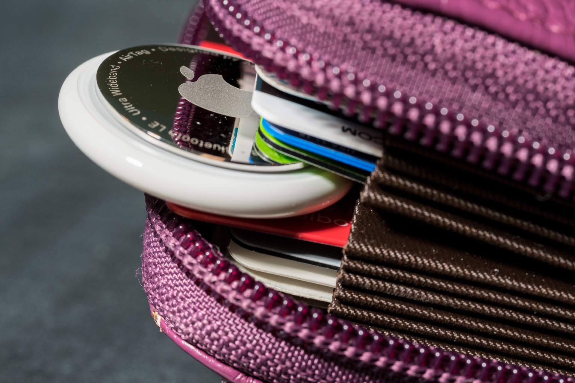 Apple AirTag item tracker in wallet