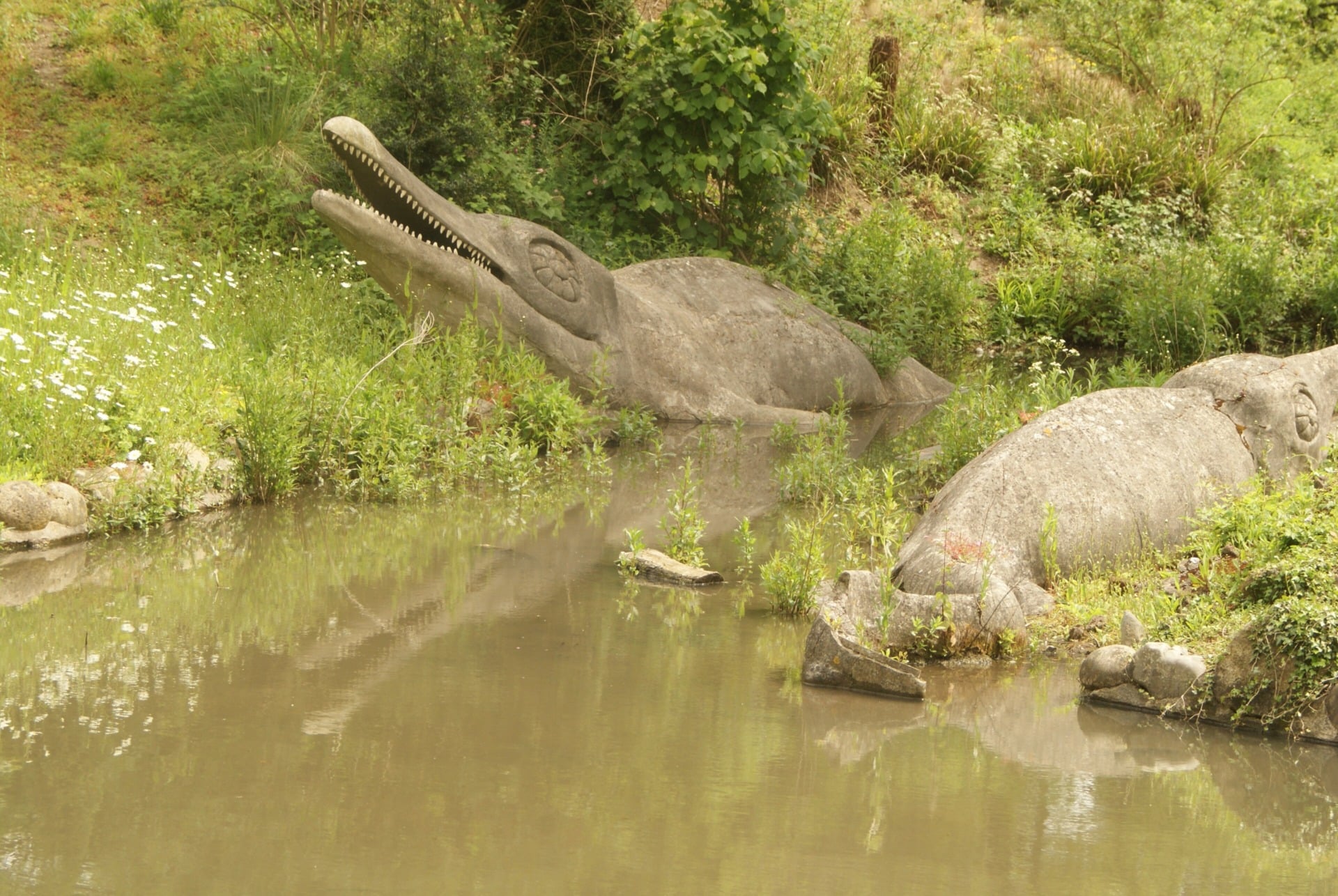 A sculpture of an ichthyosaurus in Crystal Palace Park, U.K. 
