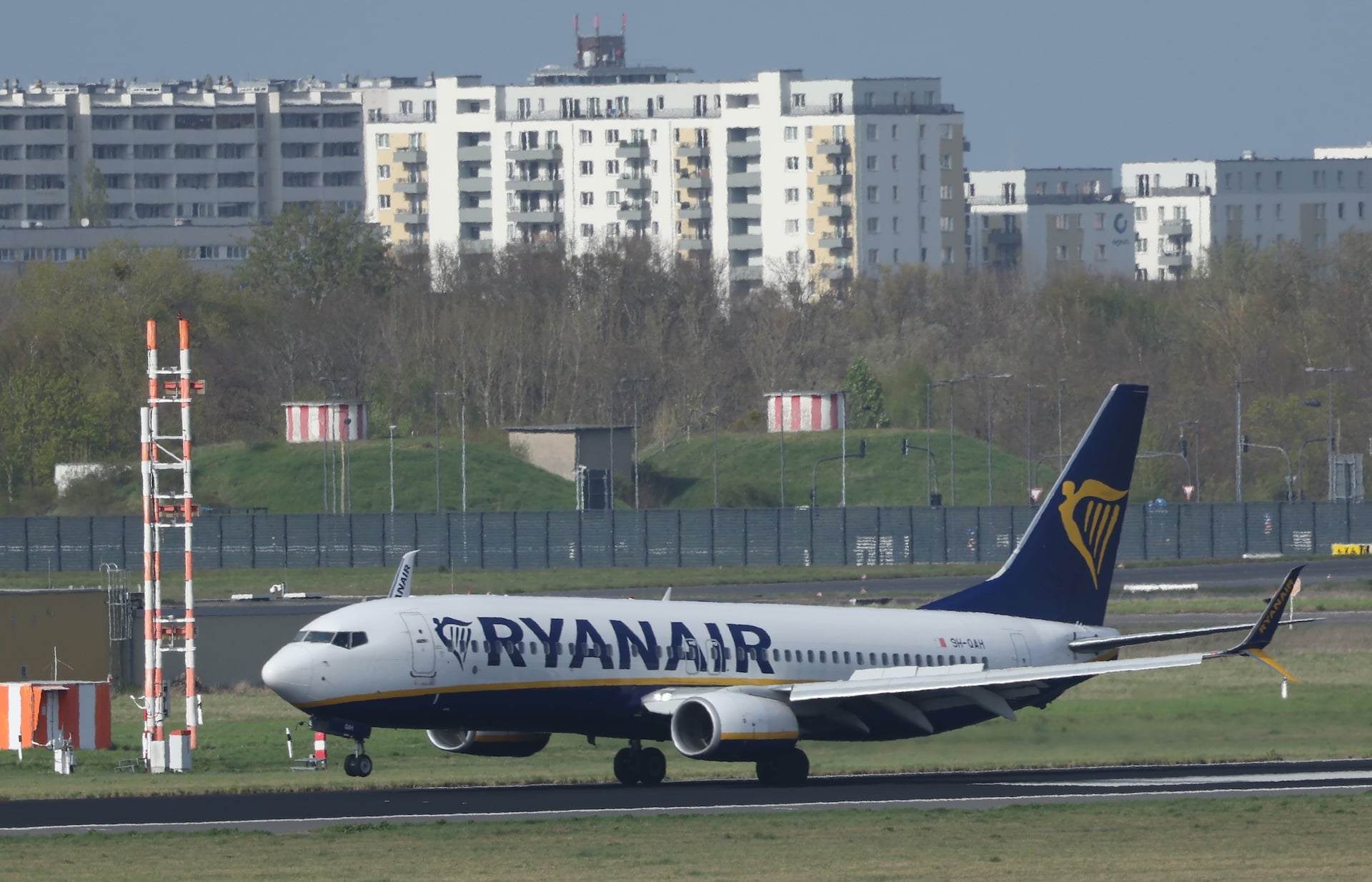 A Ryanair passenger plane touches down at Berlin Brandenburg Airport on April 24, 2026 in Schoenefeld, Germany. 