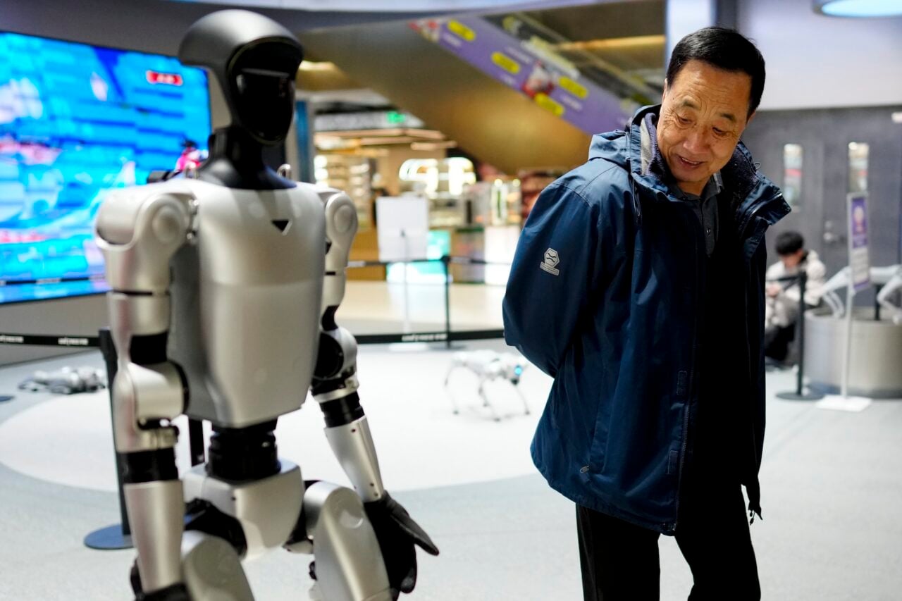 A man views products at the Unitree's first nationwide physical experience store on February 24, 2026 in Beijing, China.
