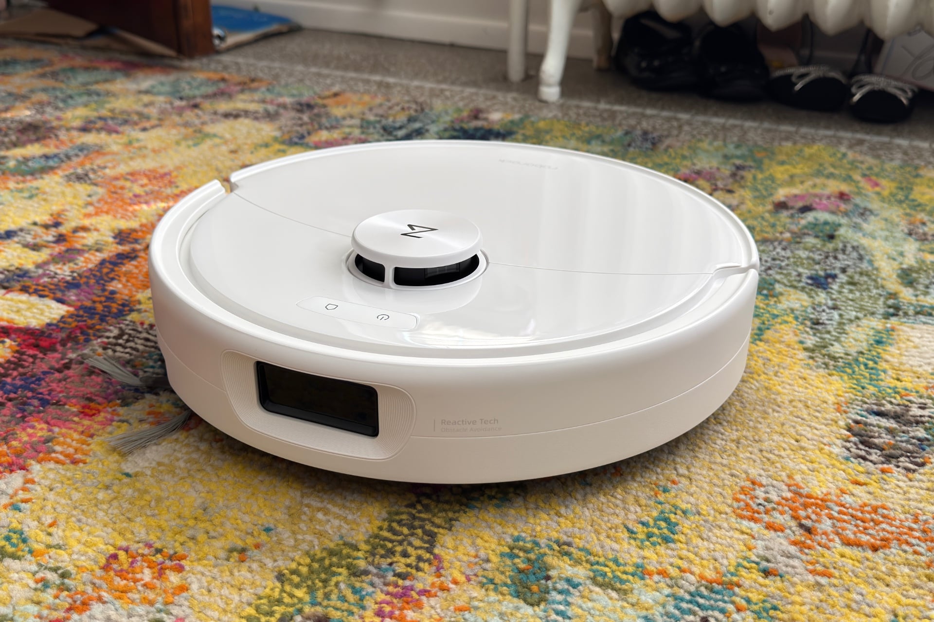 High angle front three quarter view of the Roborock Qrevo 2 Pro