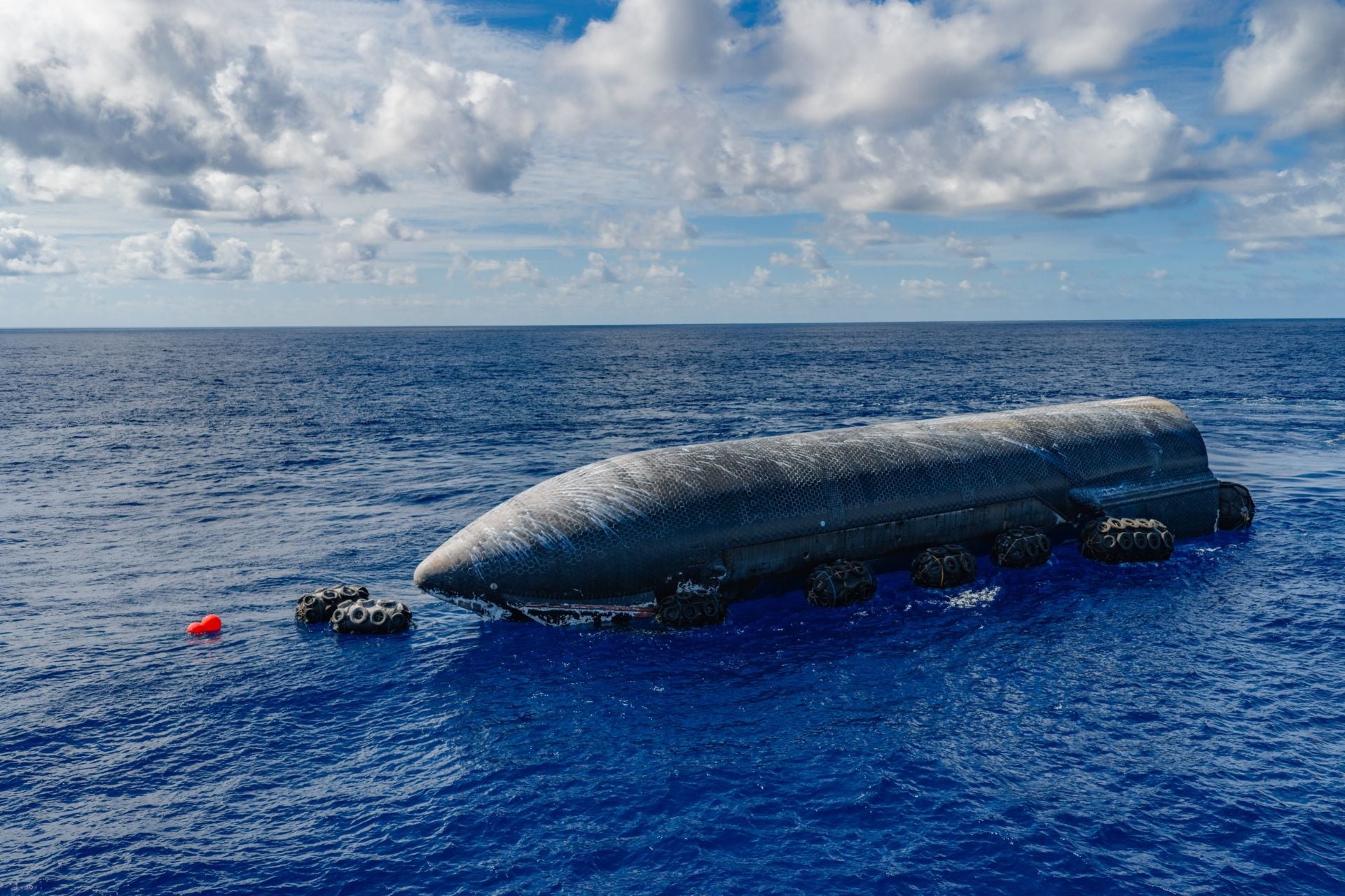 The upper stage of SpaceX's Starship rocket floats in the Indian Ocean following Flight 13. 