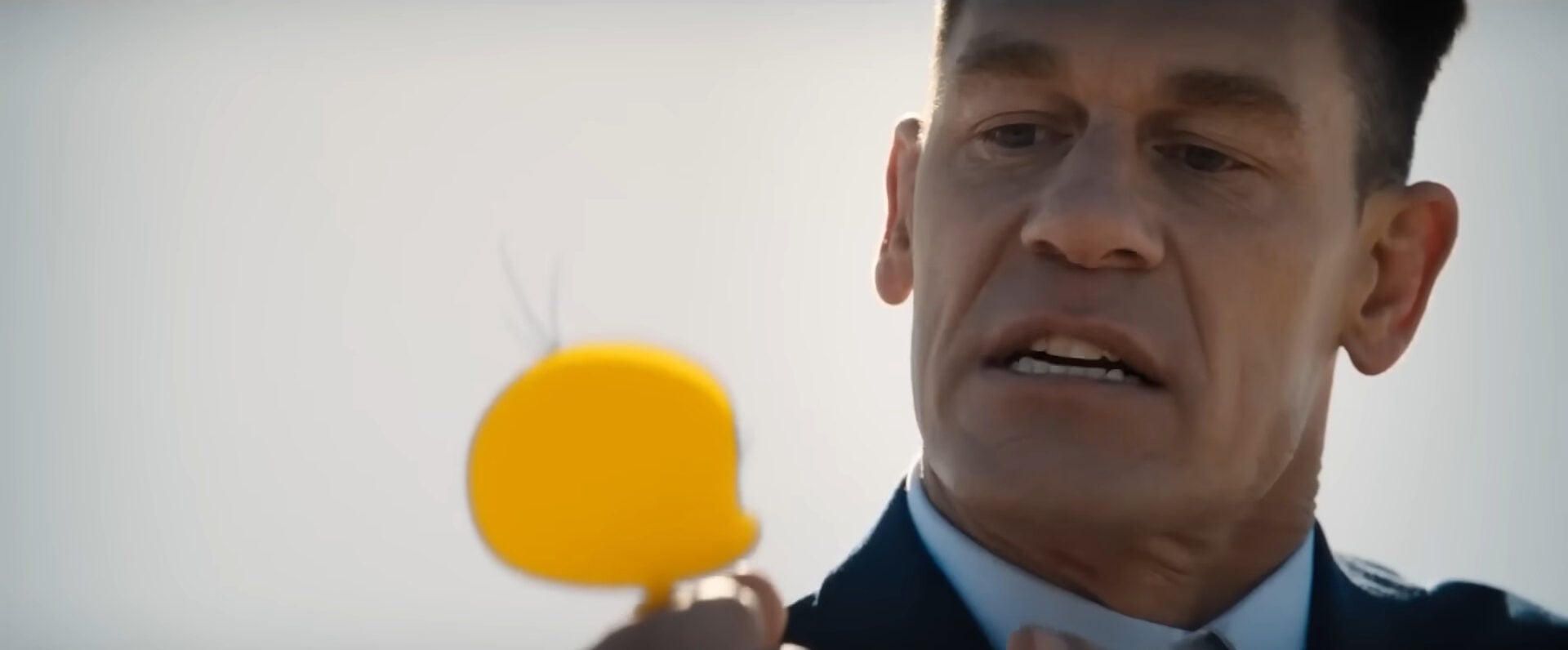 Coyote Vs ACME still of John Cena crushing a Tweety Bird.