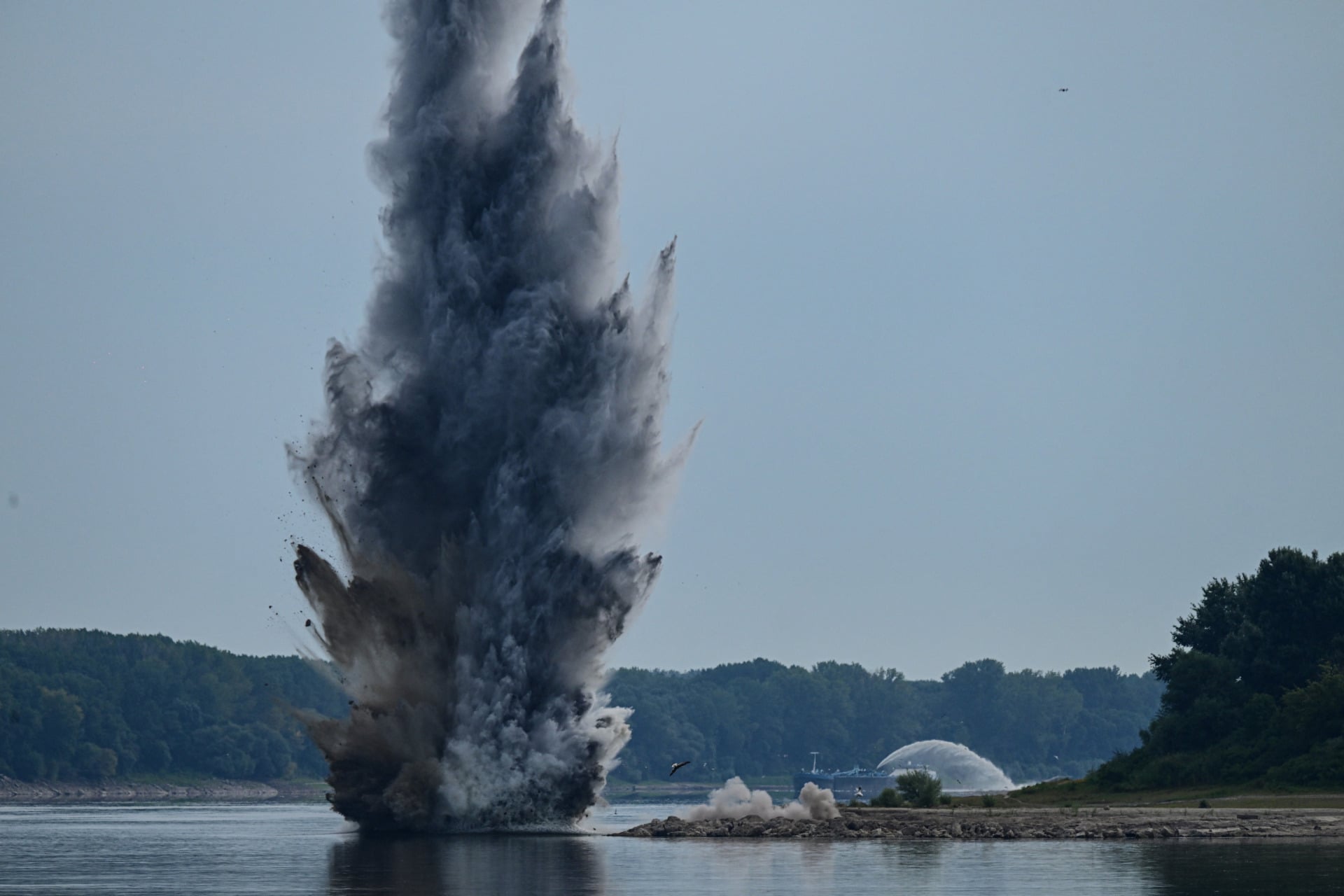 An explosion in the Danube River sends a plume of water and sediment high into the air