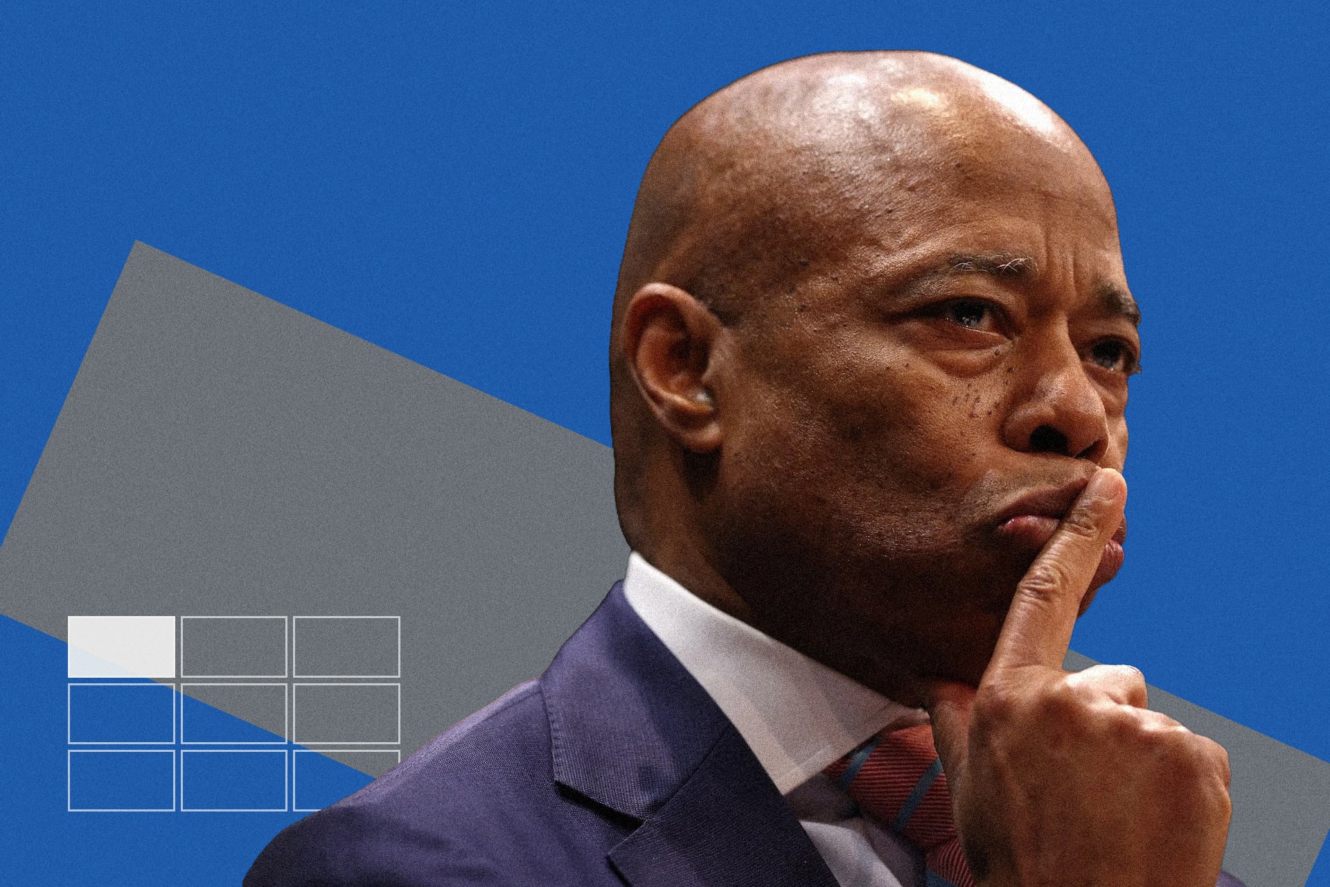 Eric Adams holding a finger to his lip