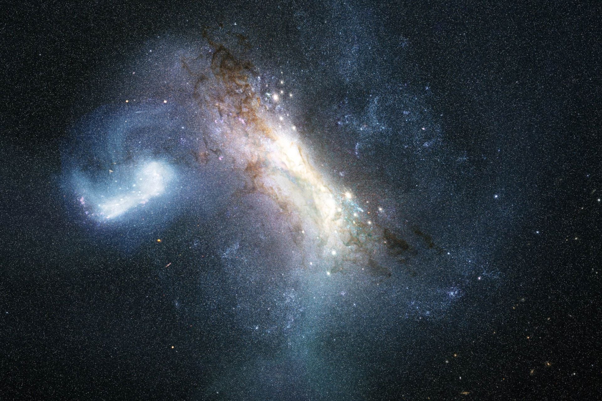 An artist’s concept of a collision between a dwarf galaxy known as LKH colliding and merging with a young Milky Way about 12 billion years ago.