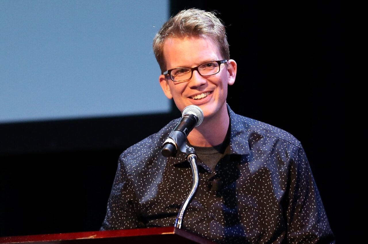 Hank Green speaking at a podium