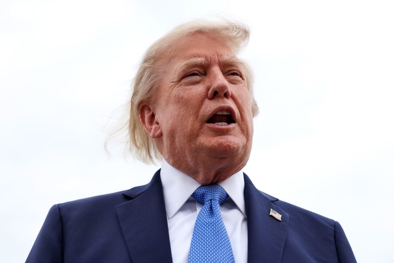 U.S. President Donald Trump speaks to reporters before boarding Air Force One on August 14, 2026 at Joint Base Andrews, Maryland.