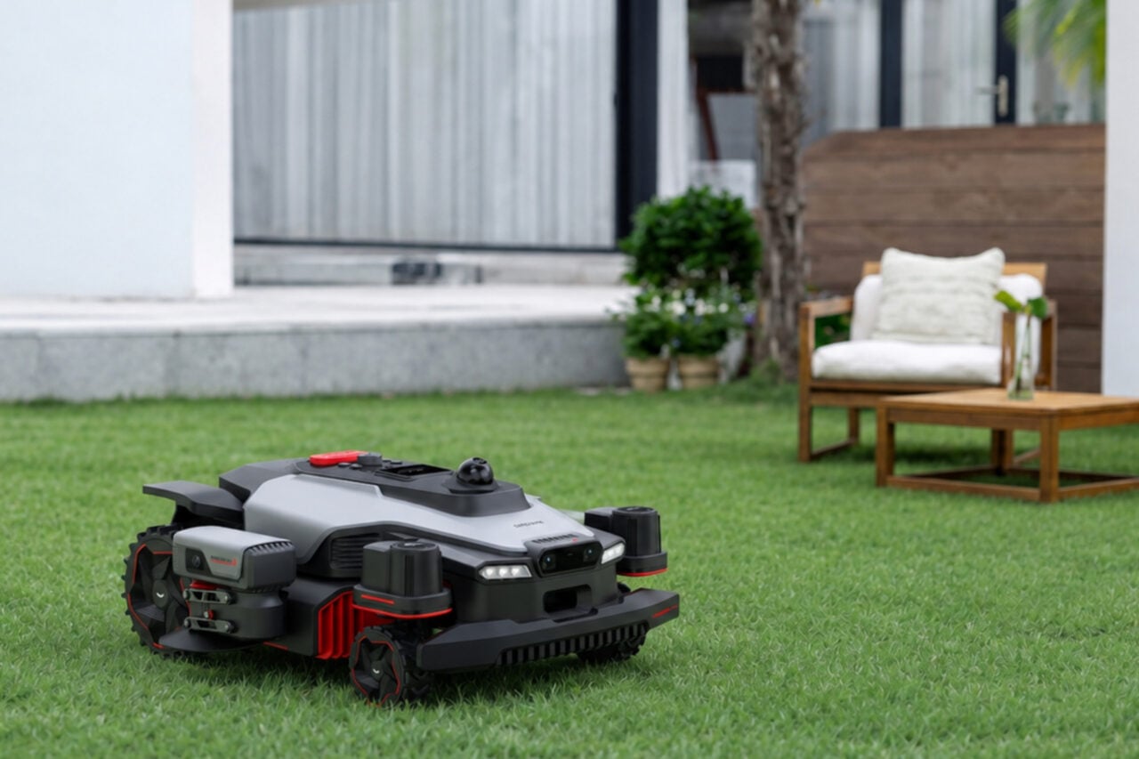 Dreame A4 Awd Pro sitting on grass.