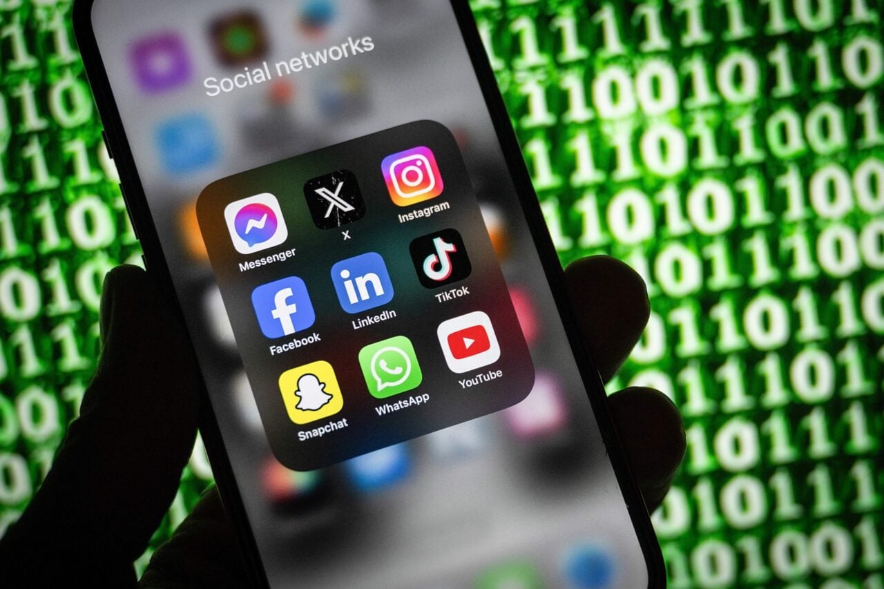 Social media apps shown on a phone