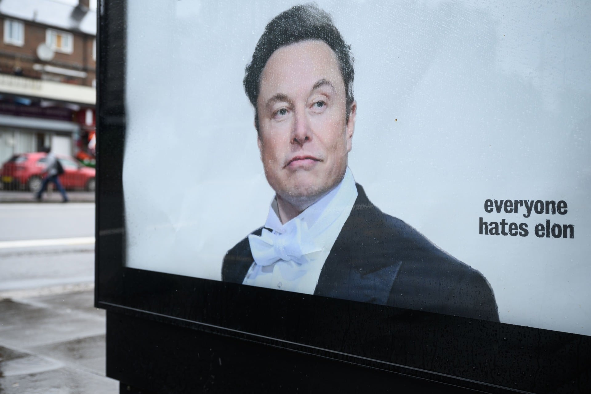 A poster with the caption "everyone hates elon", posted around the time Elon Musk briefly achieved trillionaire status.
