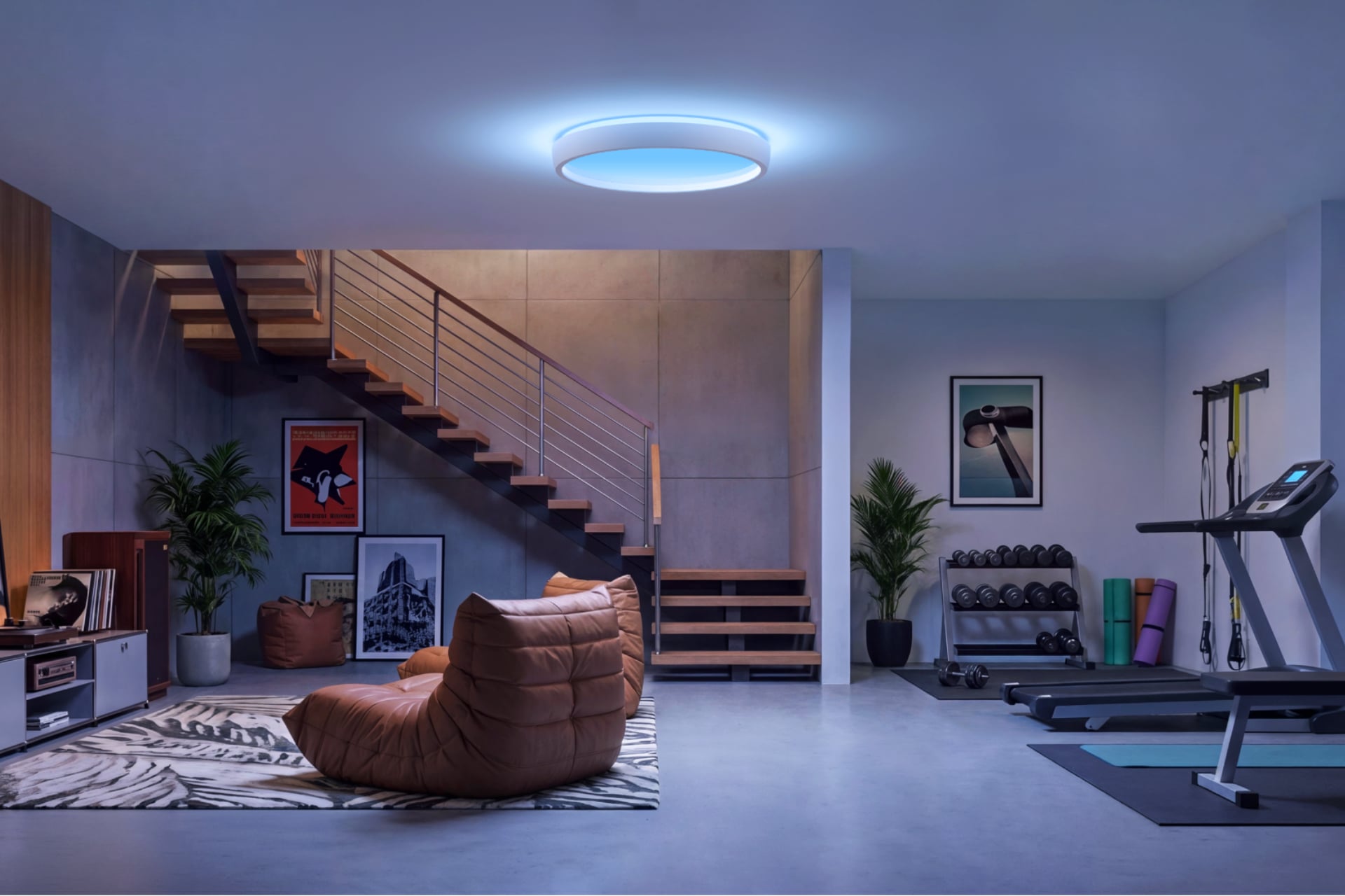 Govee Sky Ceiling Light showing a blue hue in what looks like a basement setting.