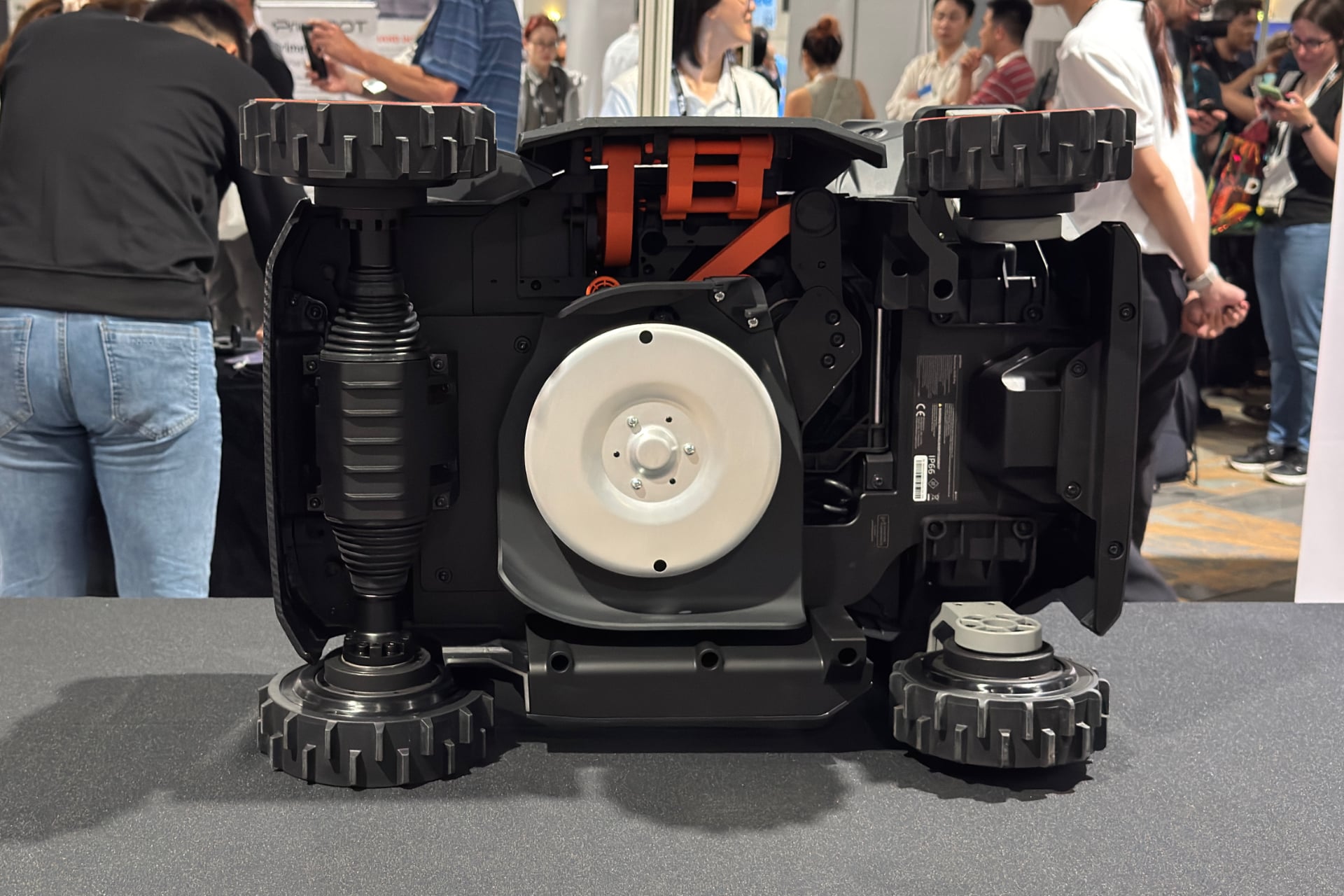 Picture of the bottom of the Segway Navimow H5 Pro, showing its single mowing disc. No cutting blades are visible.