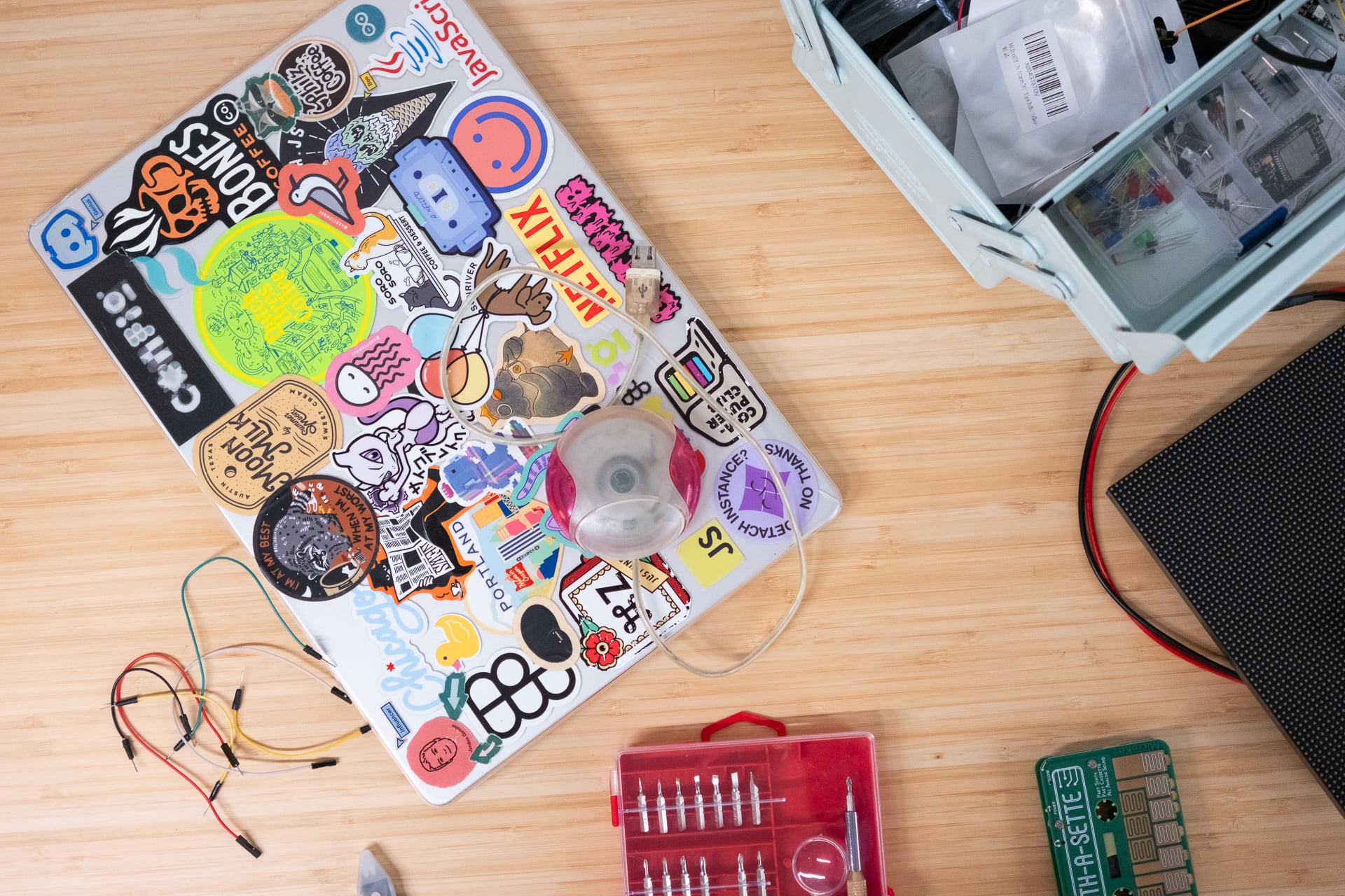 A photo of Tru Narla's laptop and tools.