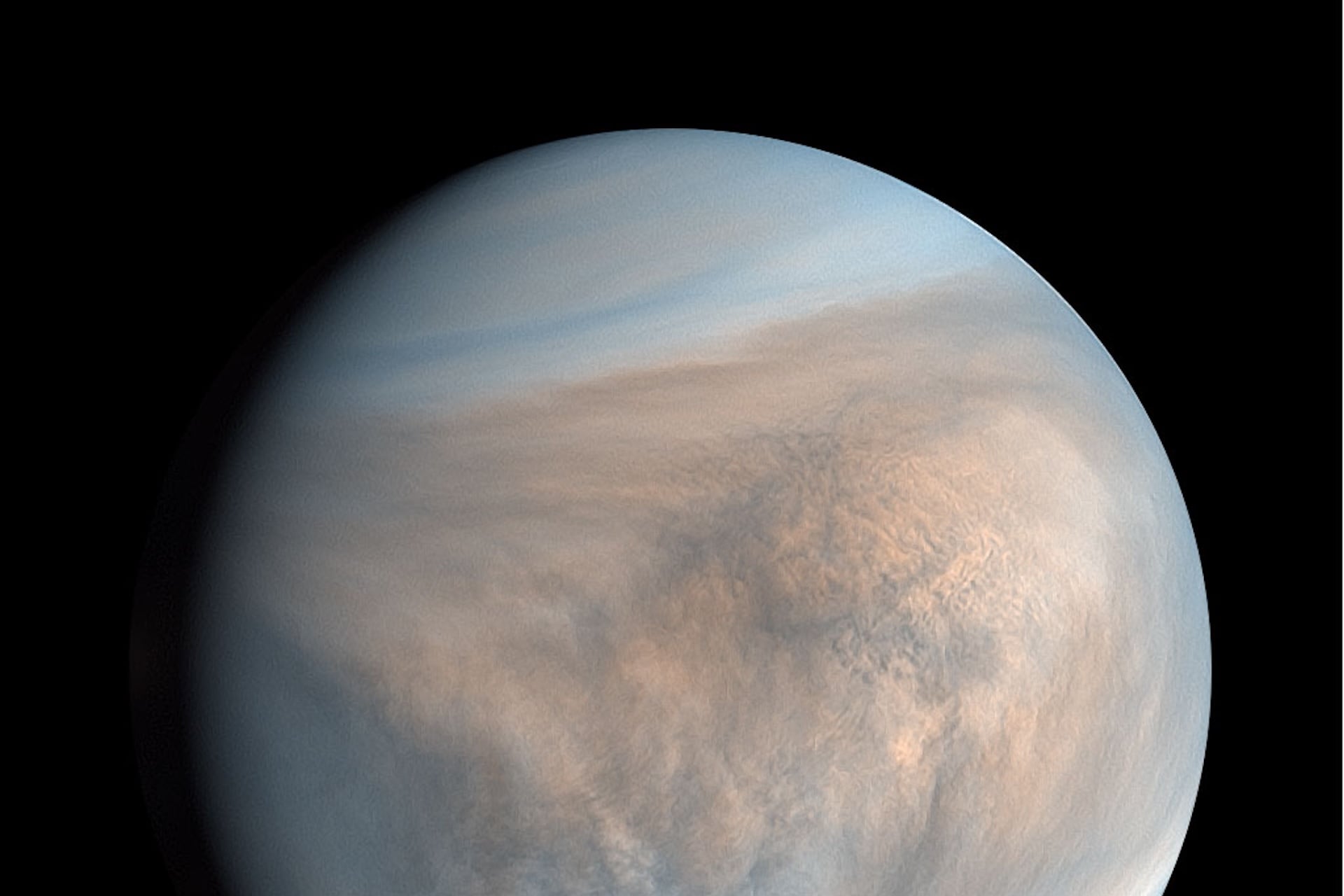 This false color image of Venus, adapted from ultraviolet measurements taken in 2023 by Japan’s JAXA Akatsuki spacecraft, depicts its abundant sulfur dioxide cloud content in faint blue.