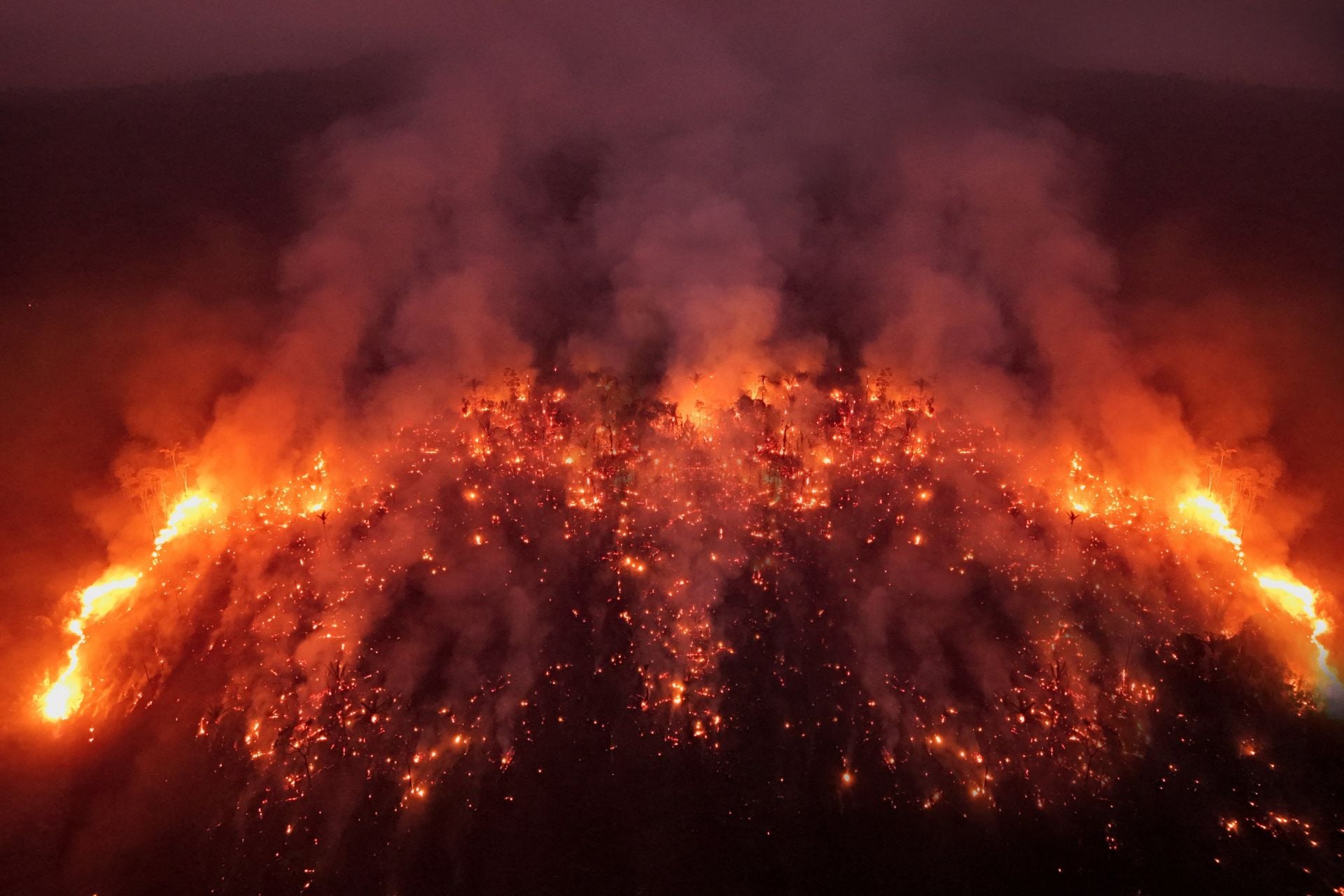 Wildfire rages in the Amazon rainforest in late July, 2026. 