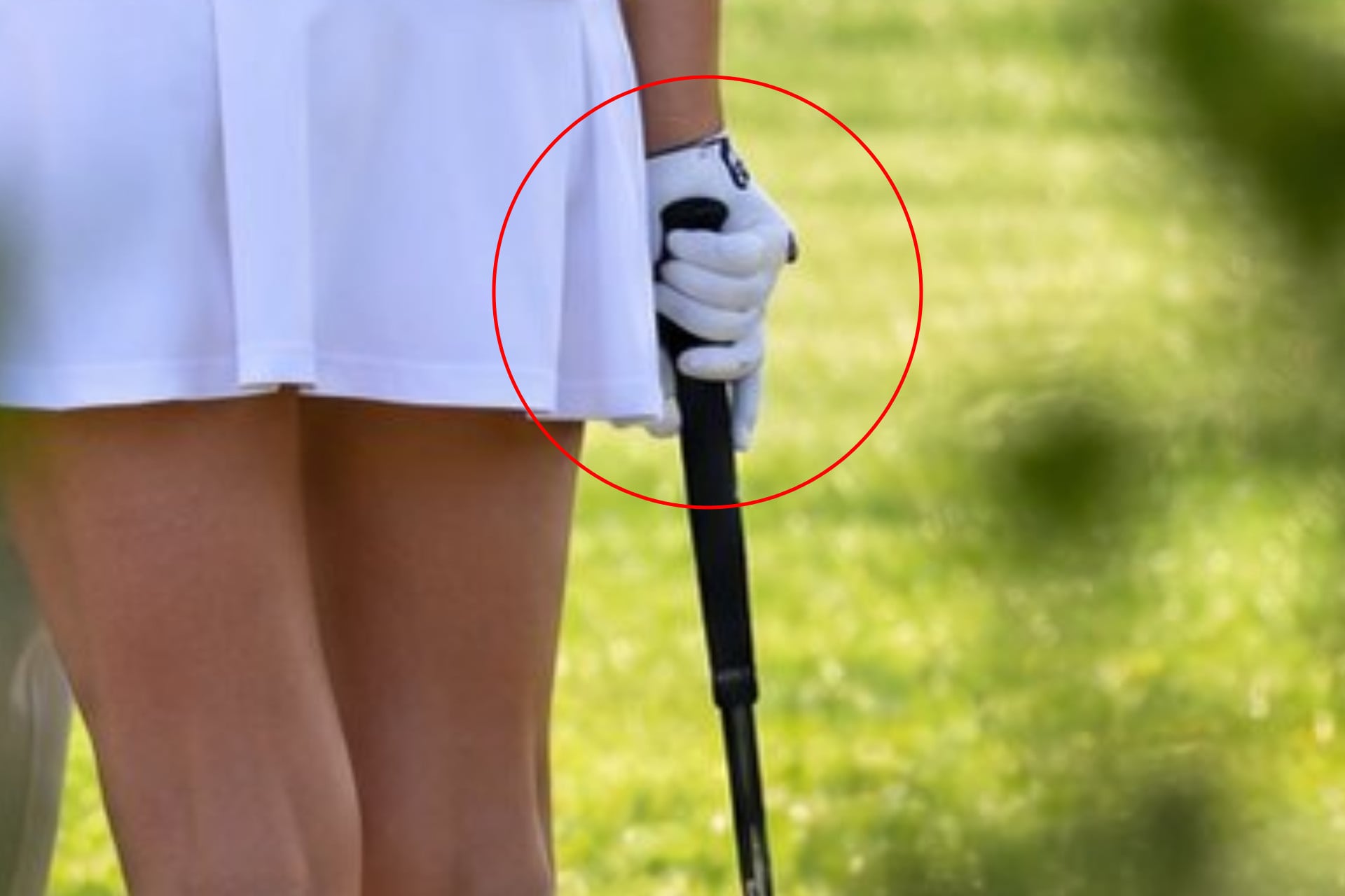 Close-up of a viral AI image showing that Natalie Harp has six fingers.