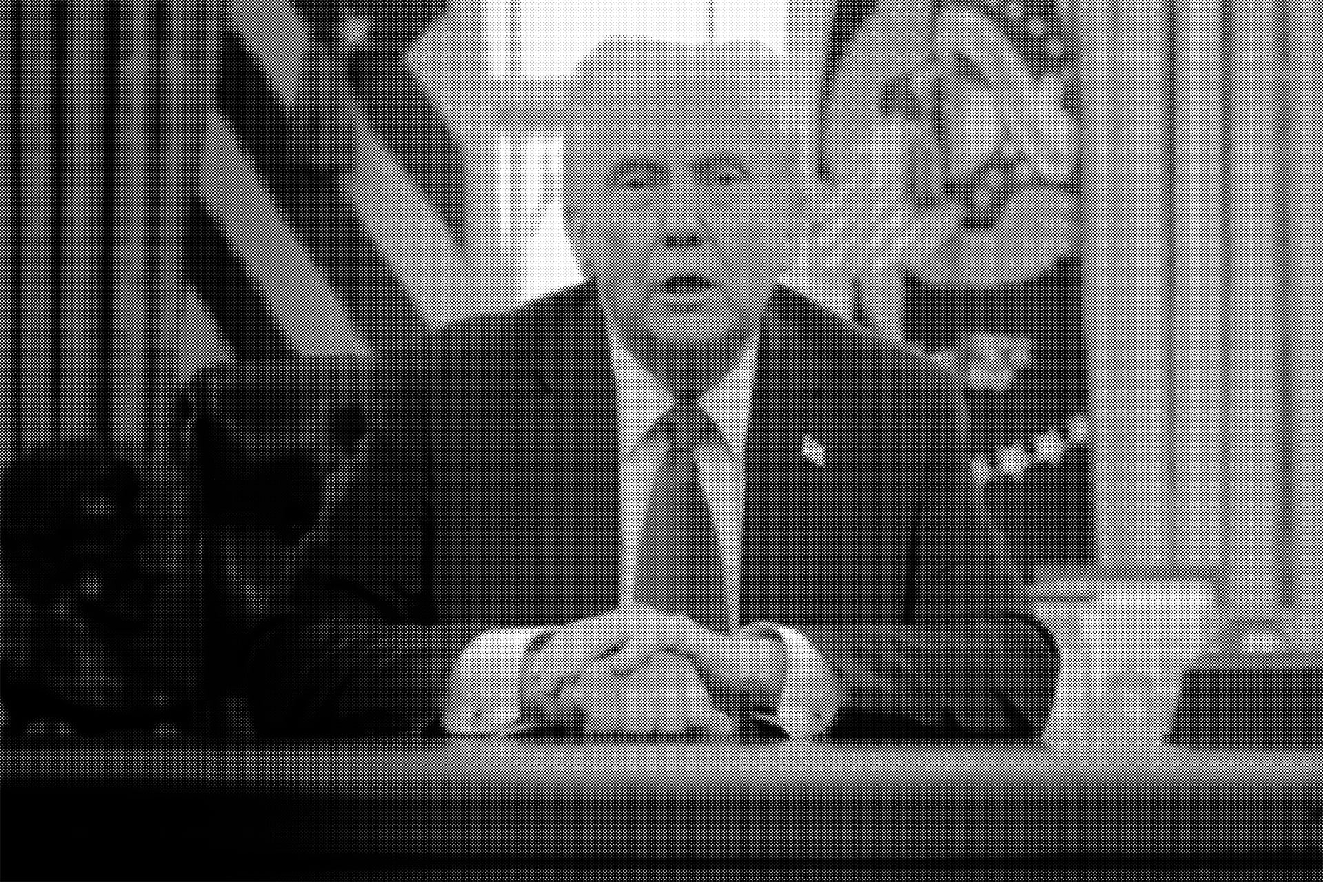 U.S. President Donald Trump talks to reporters from the Resolute Desk after signing an executive order to appoint the deputy administrator of the Federal Aviation Administration in the Oval Office at the White House on January 30.